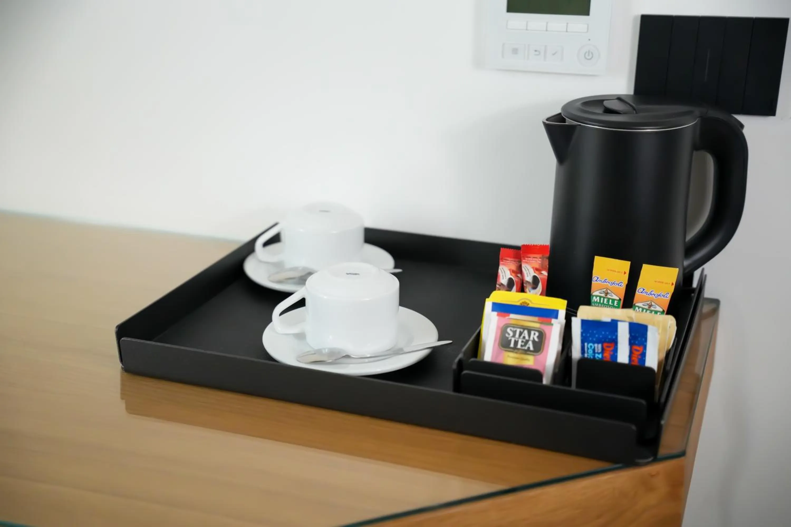 Coffee/tea facilities in Plana Hotel