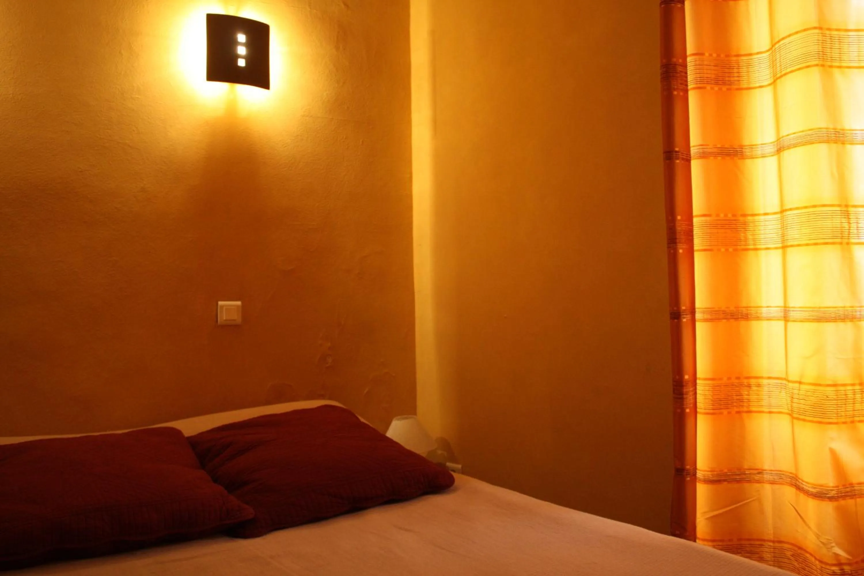 Bed in Hôtel de Valdeblore