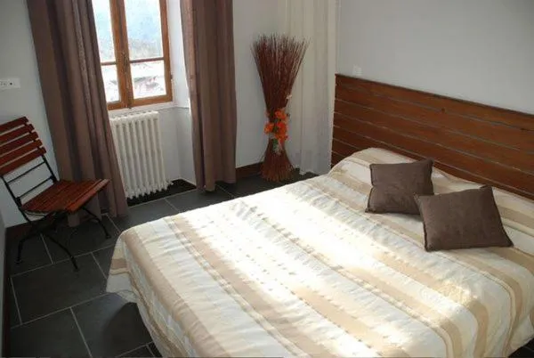 Bed in Hôtel de Valdeblore
