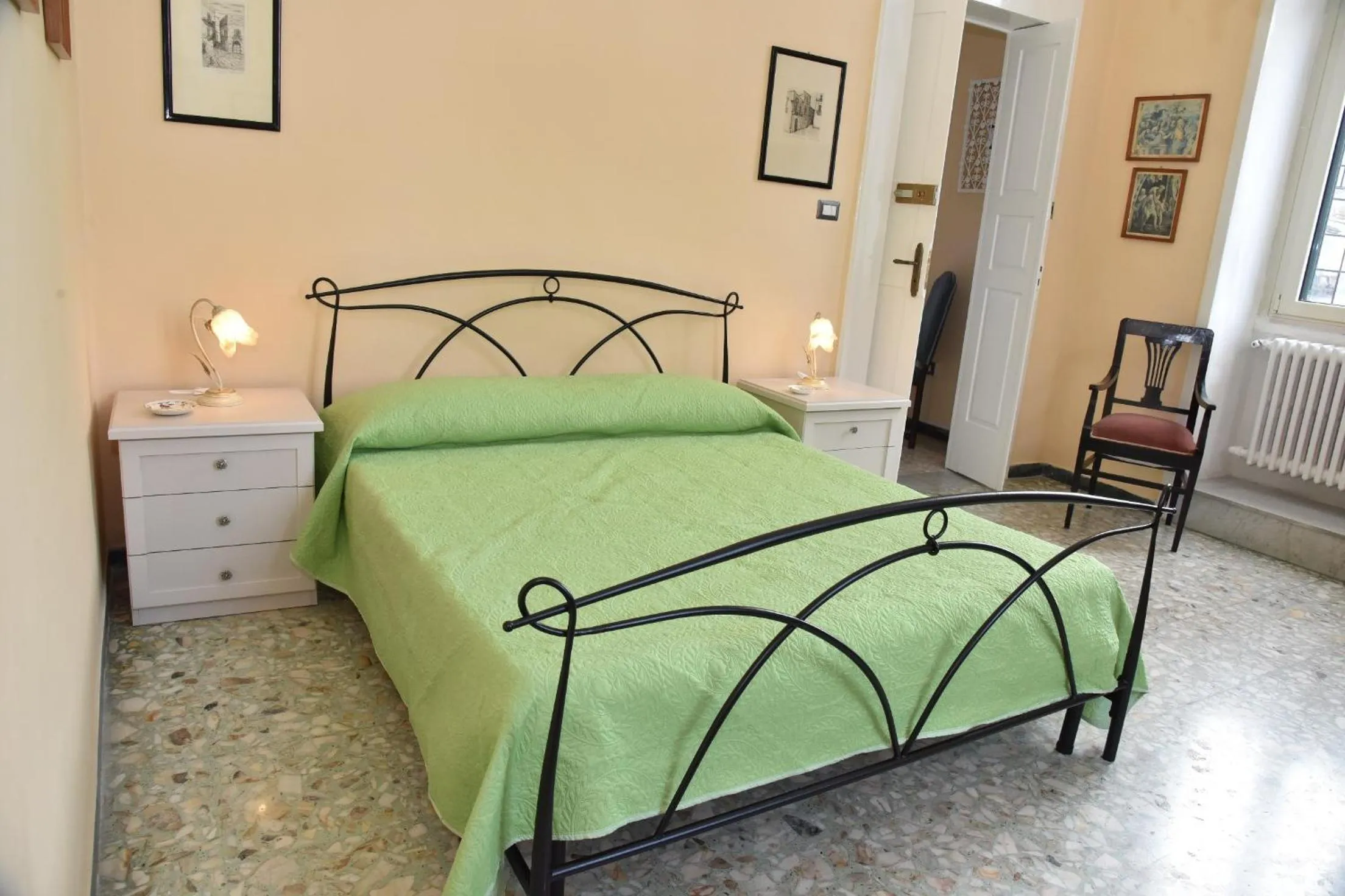 Bed in Rosaria Suite & Rooms