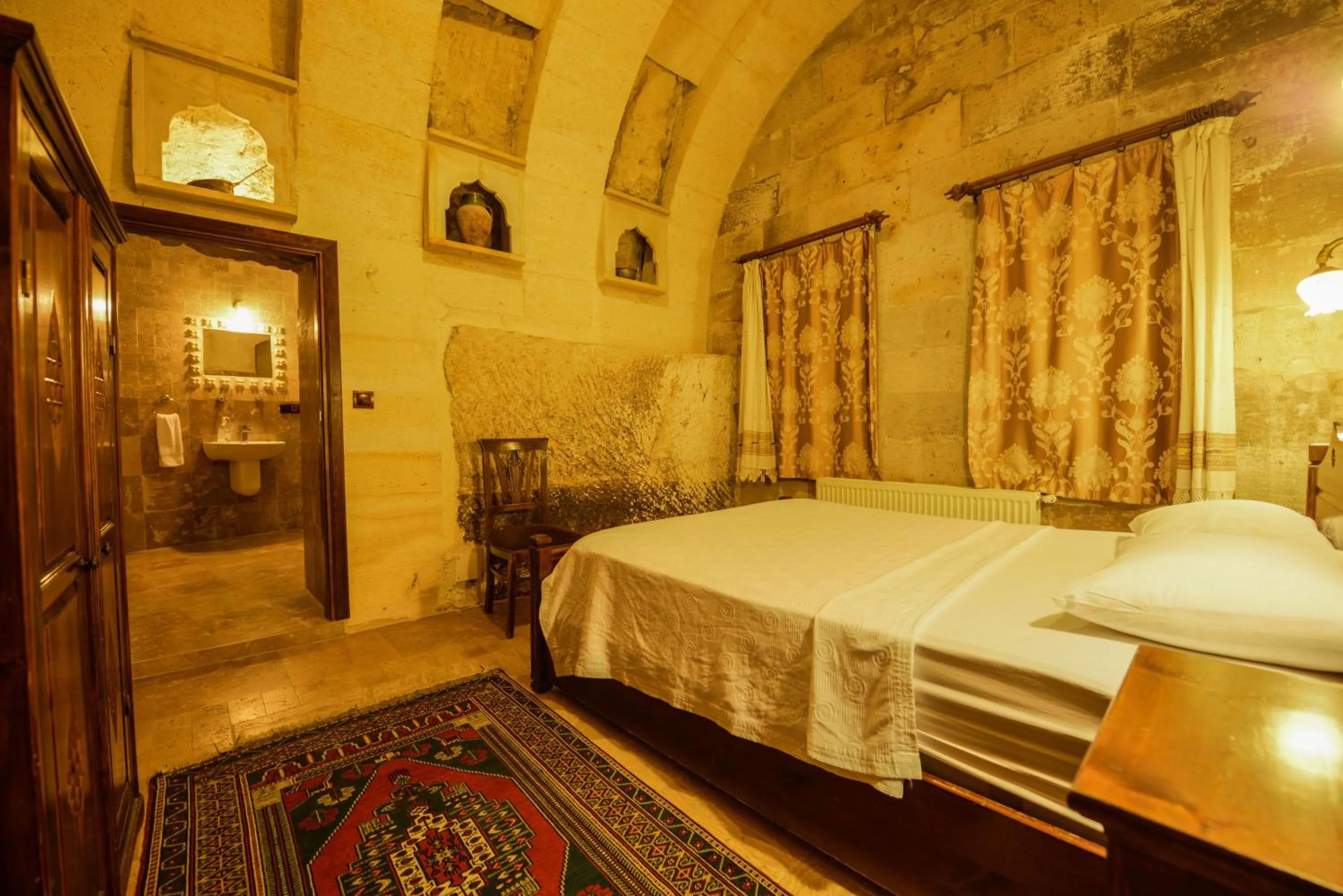 Bed in Vineyard Cave Hotel