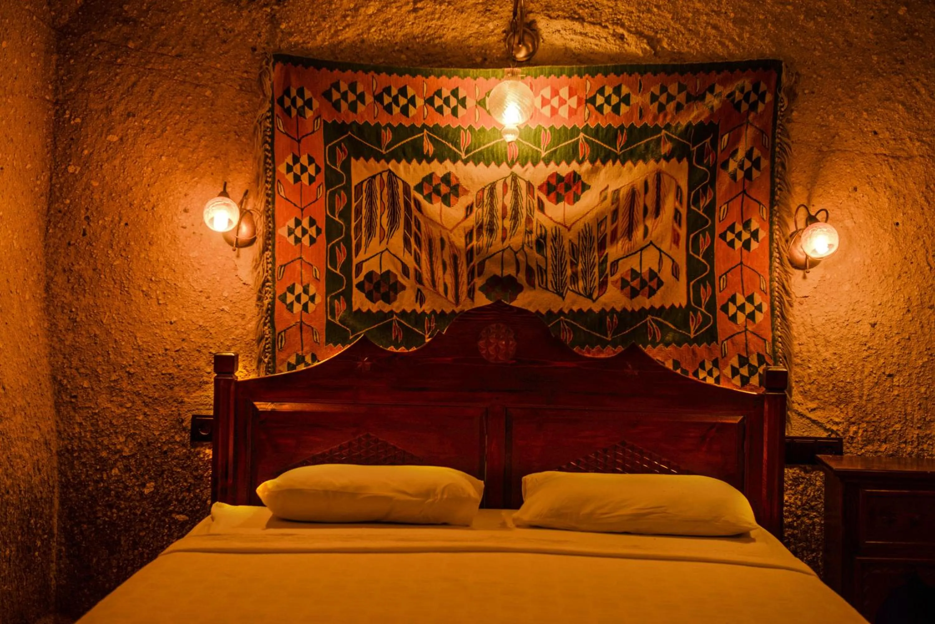Bed in Vineyard Cave Hotel