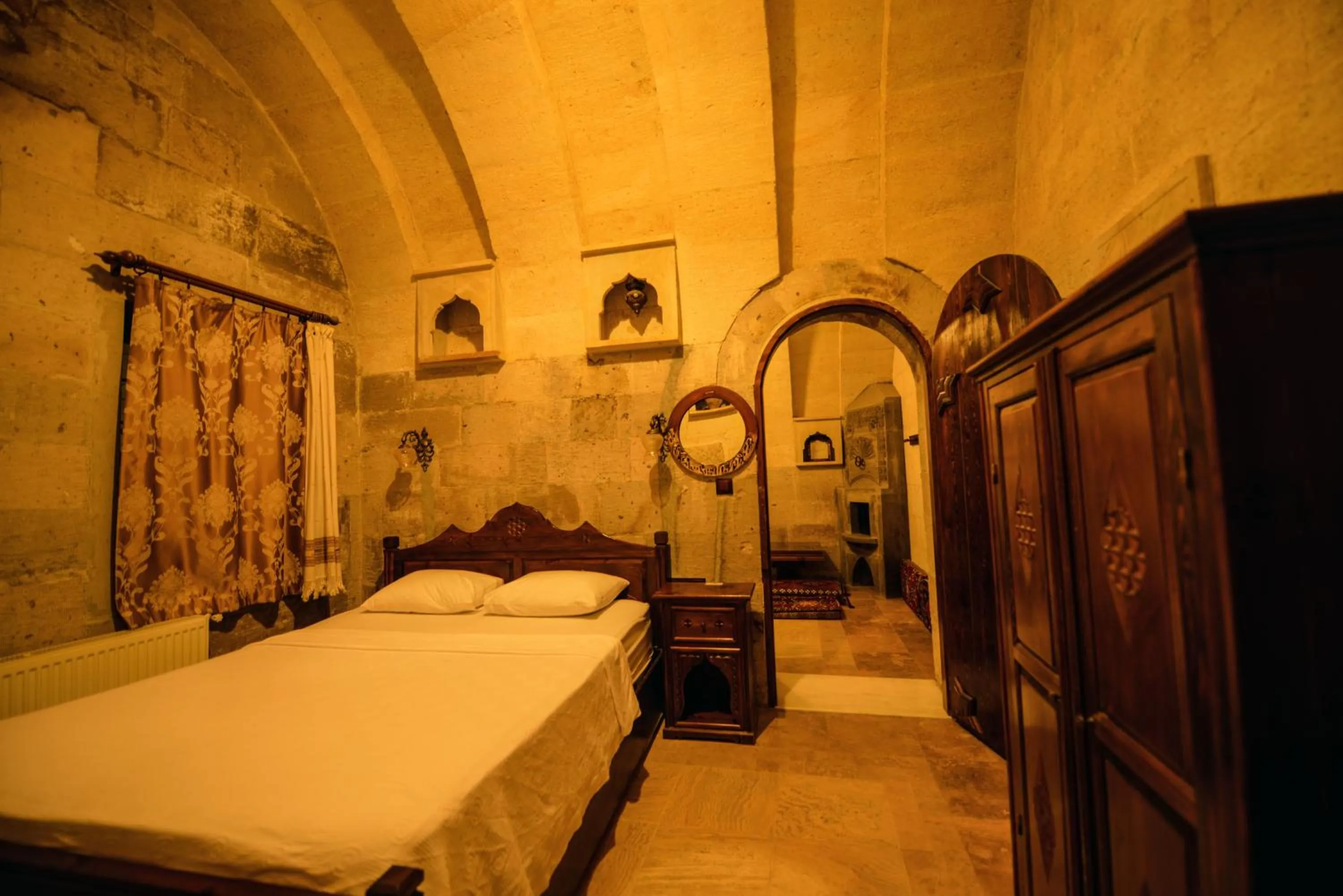 Bed in Vineyard Cave Hotel