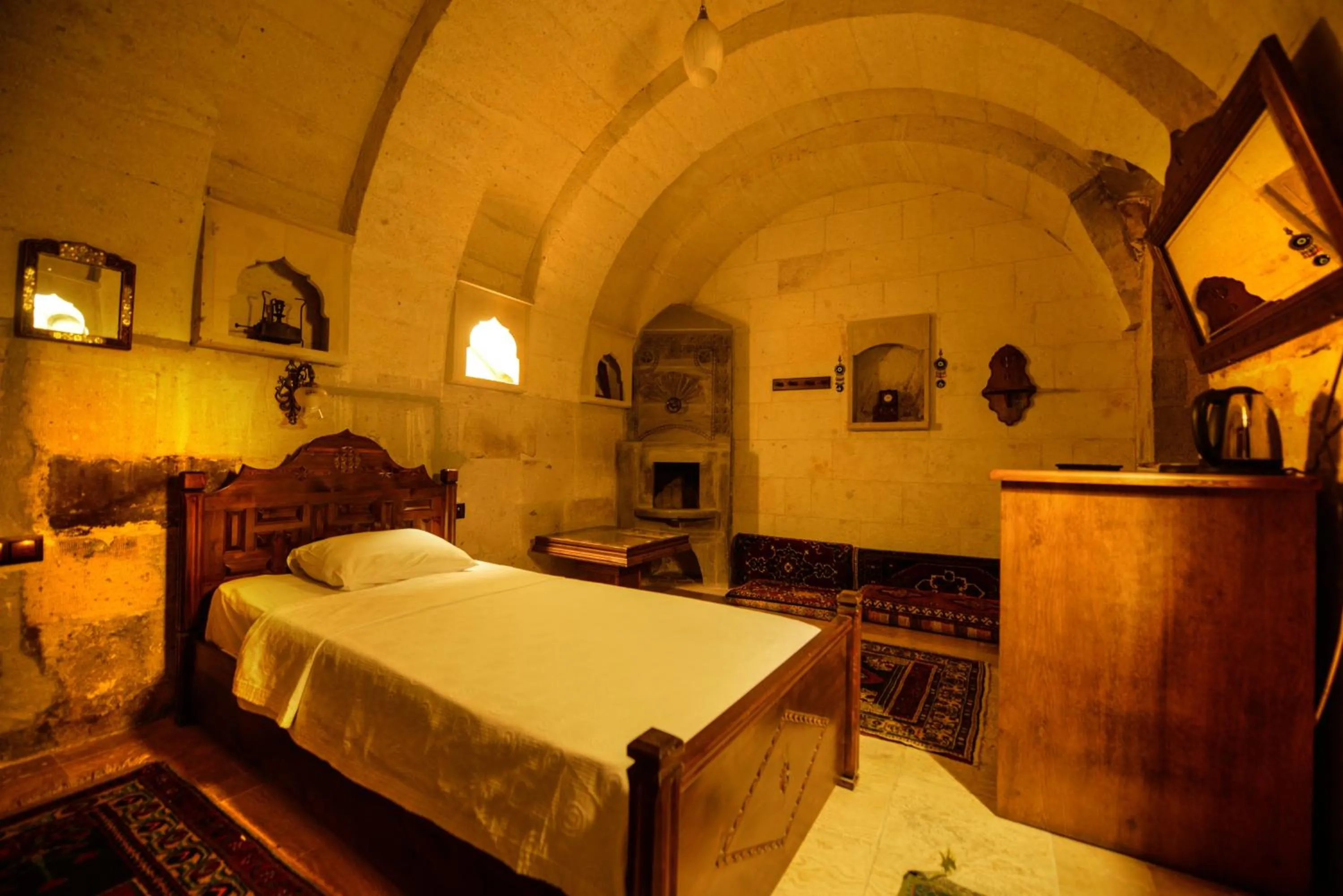 Bed in Vineyard Cave Hotel