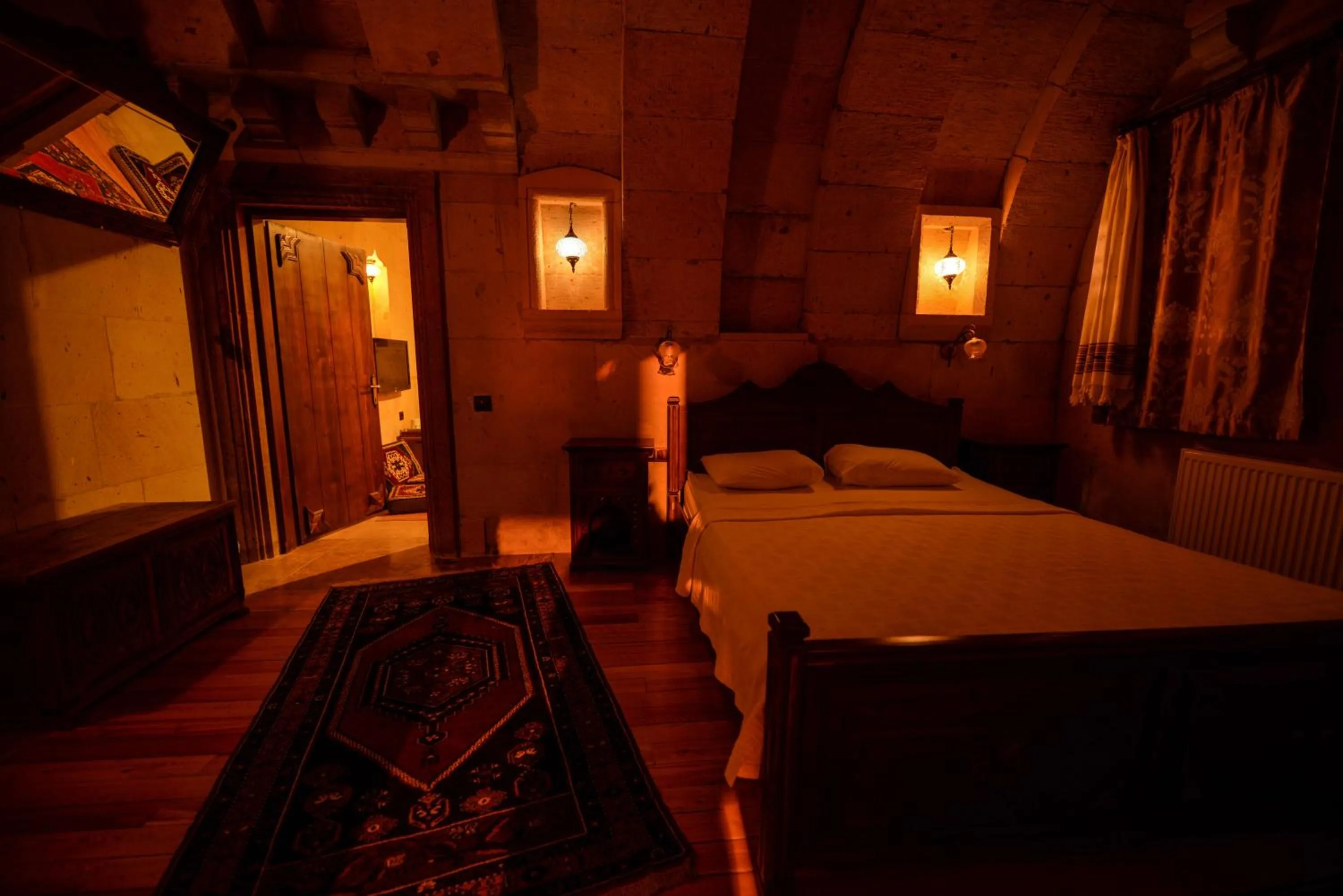 Bed in Vineyard Cave Hotel