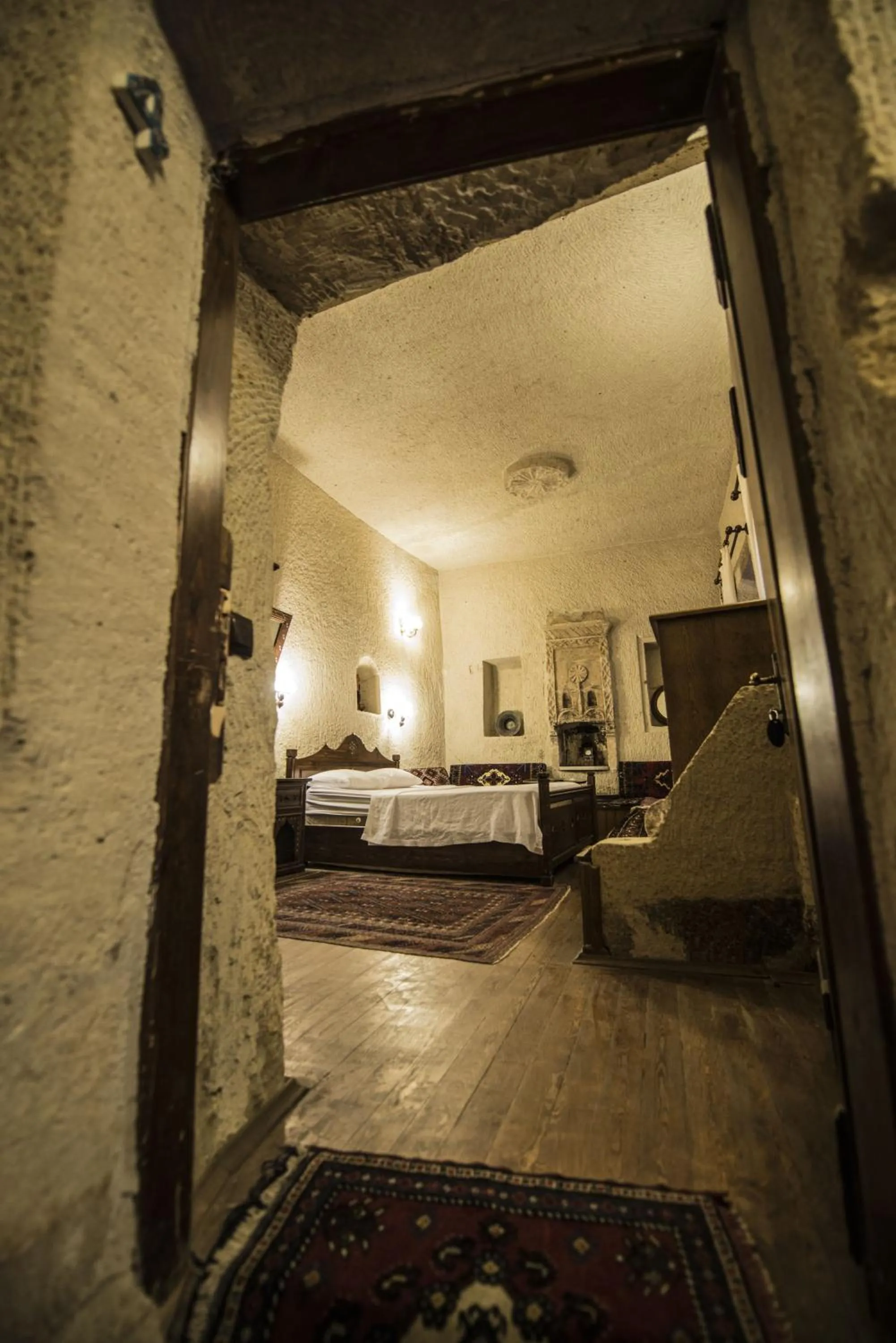 Facade/entrance, Bed in Vineyard Cave Hotel