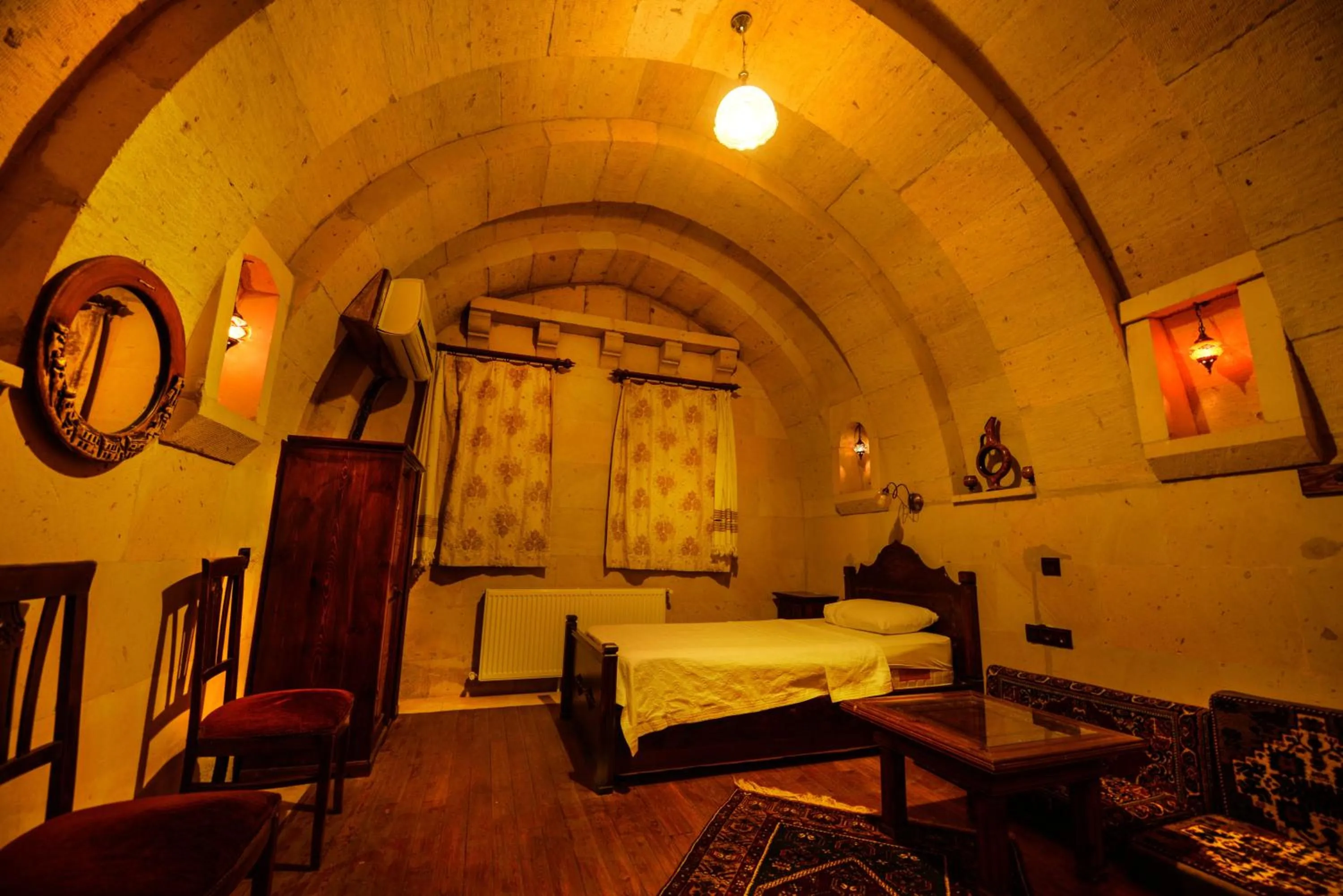 Bed in Vineyard Cave Hotel