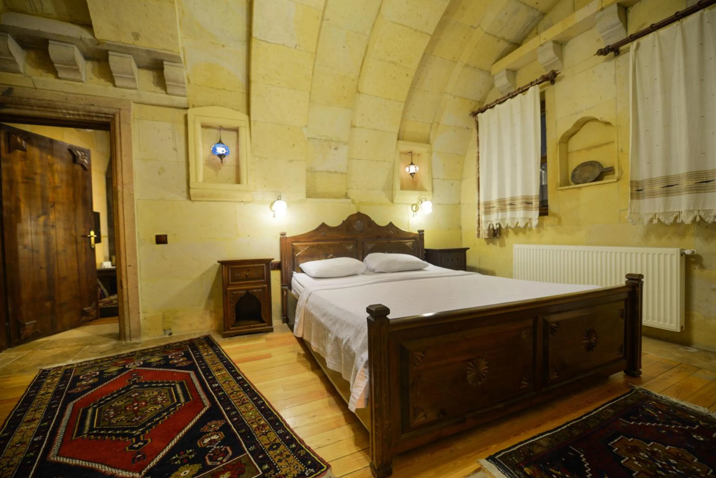 Bed in Vineyard Cave Hotel