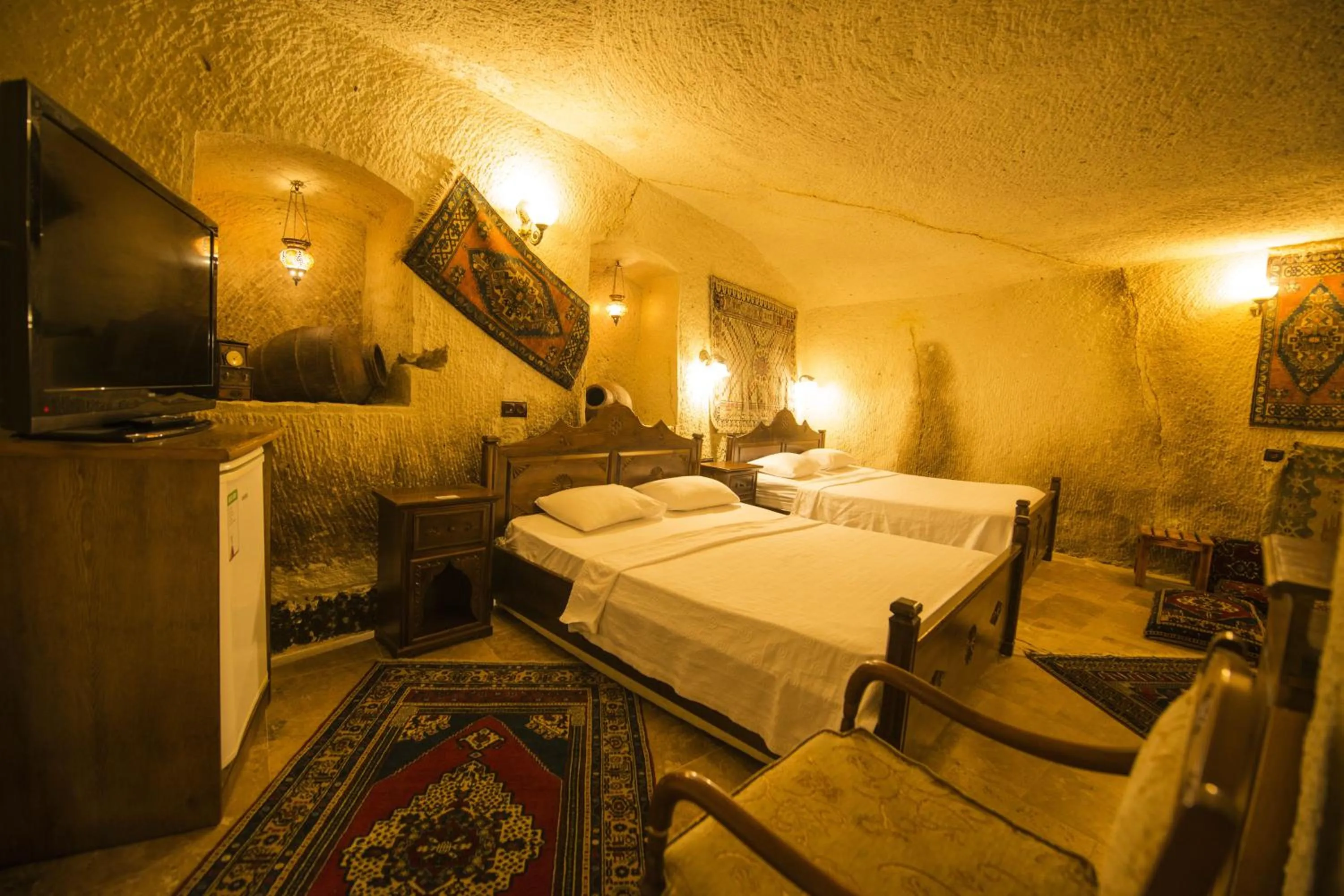 Bed in Vineyard Cave Hotel