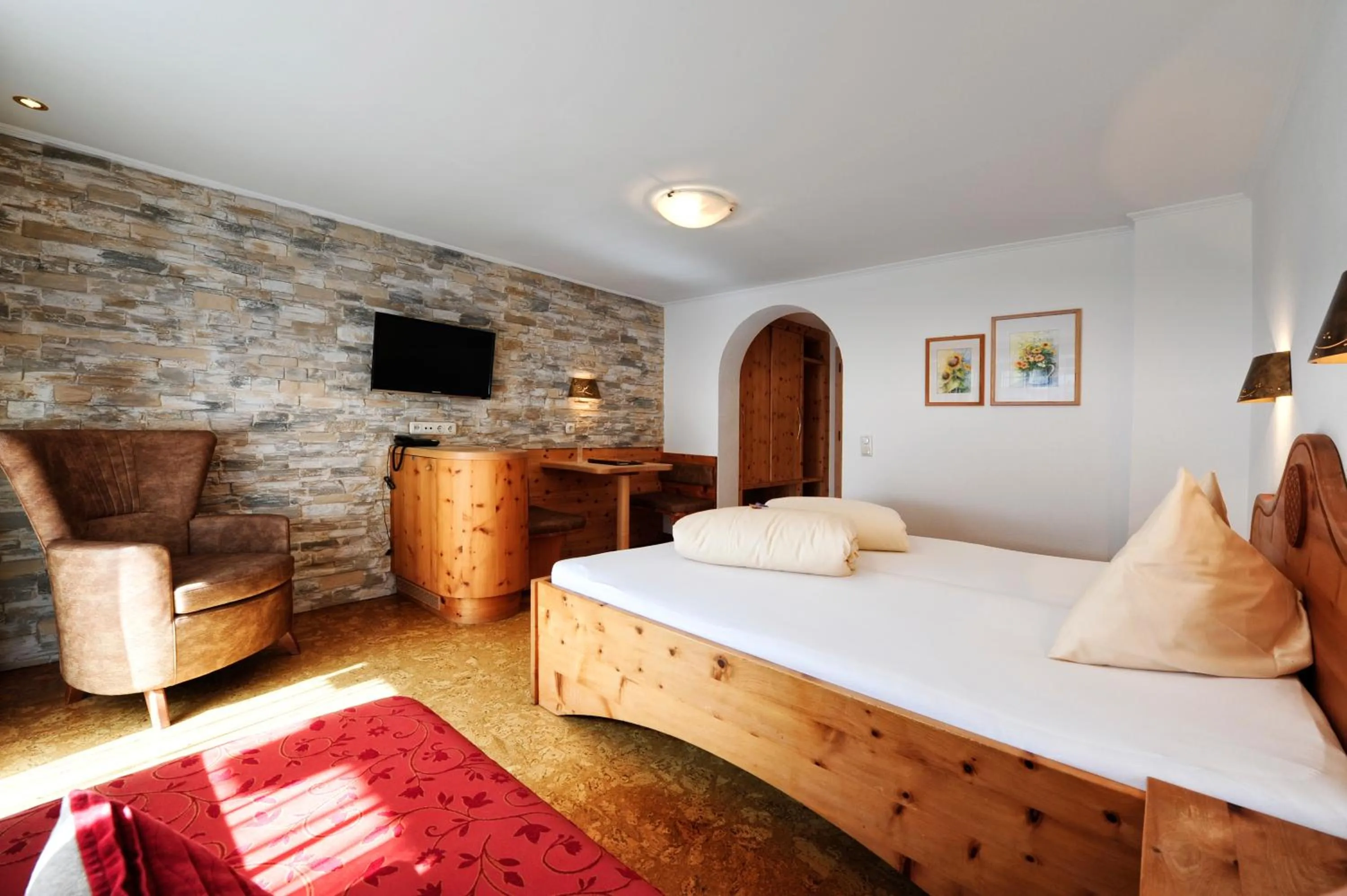 TV and multimedia, Bed in Hotel Arnika