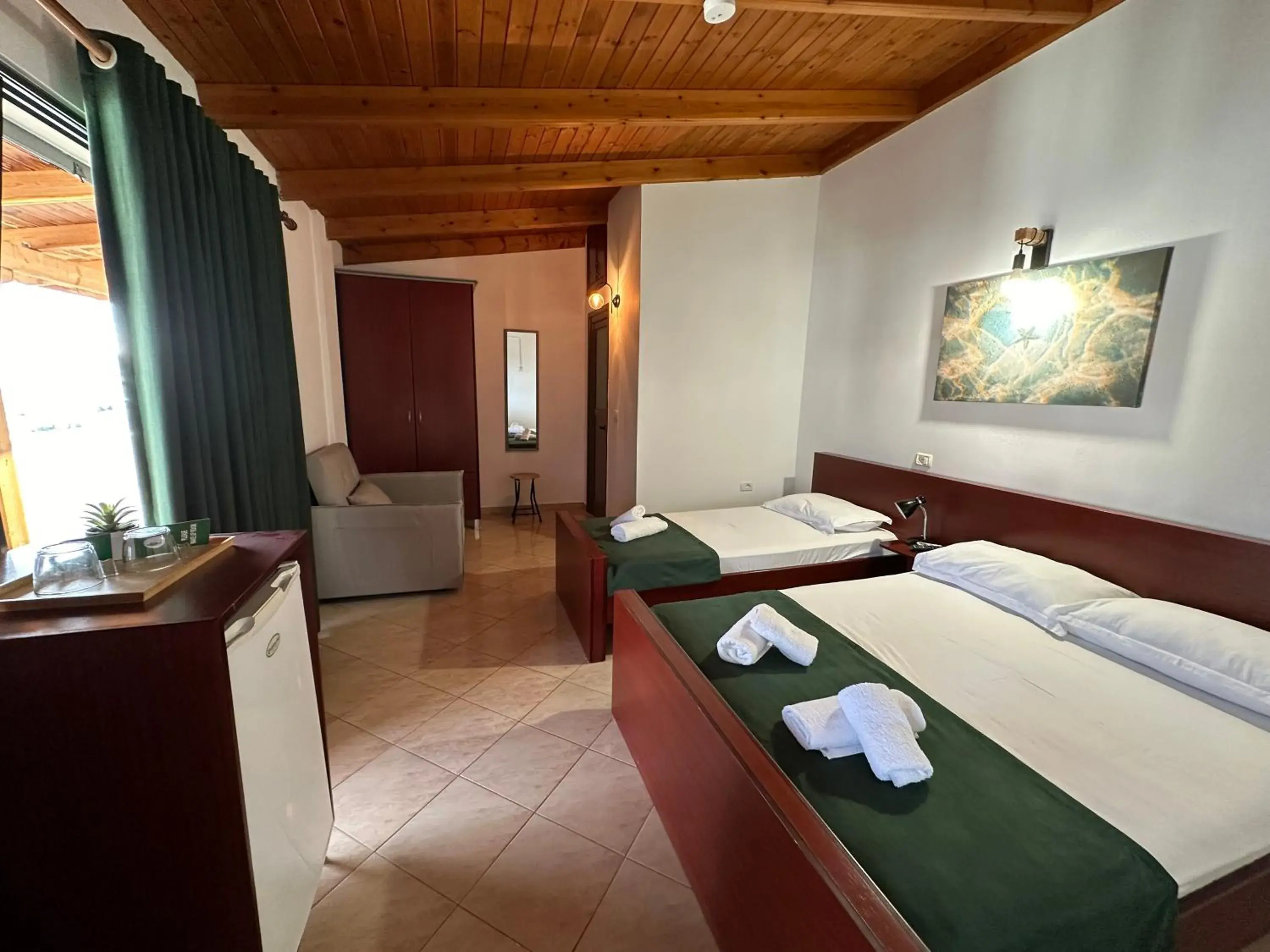 Quadruple Room with Shared Balcony in BLISS Hotel Quadruple Room with Shared Balcony in BLISS Hotel