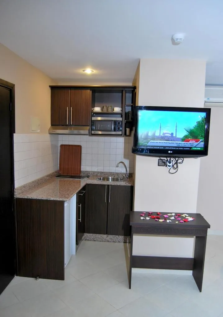 Kitchen or kitchenette in Suite Hotel Tilila
