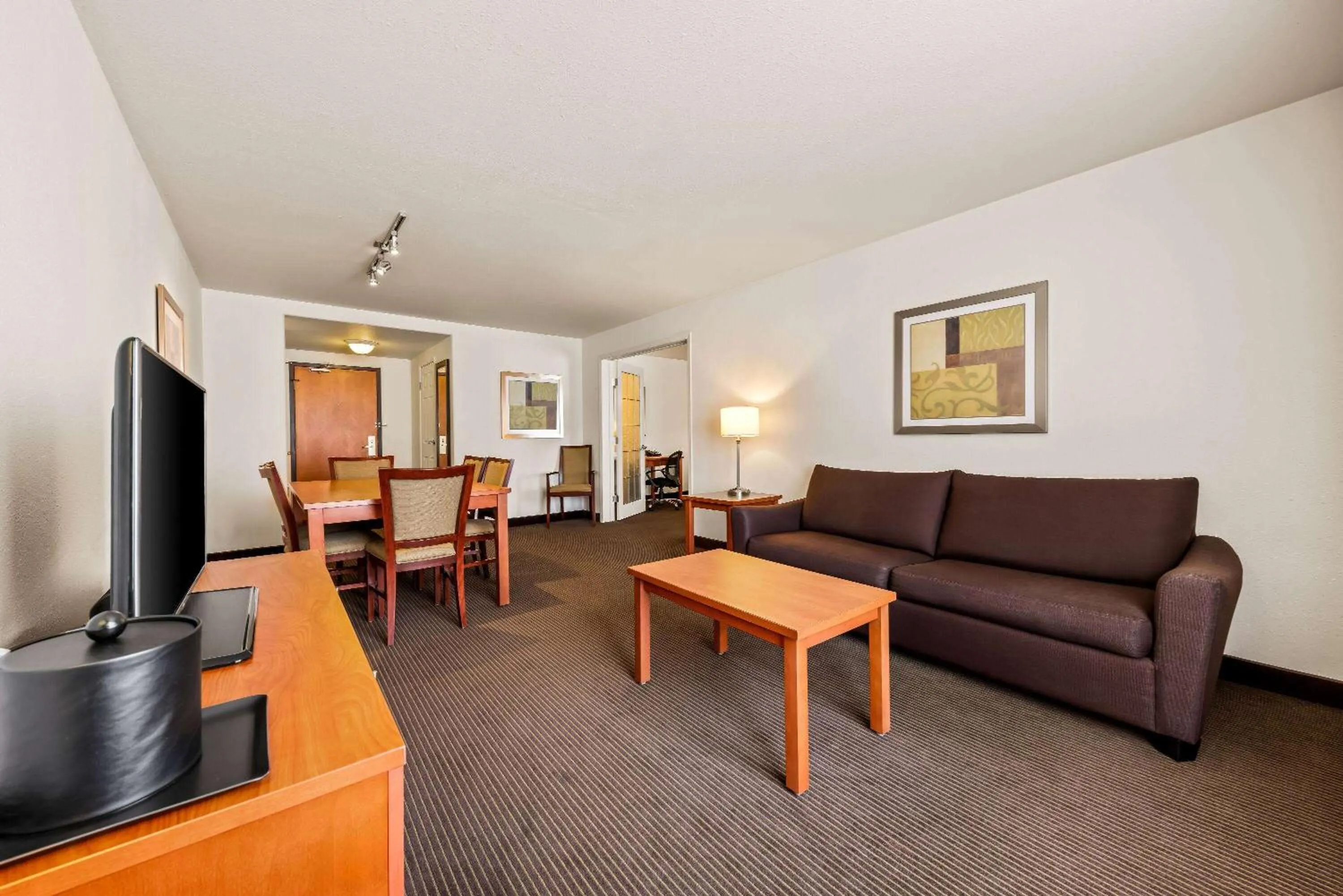 Living room in Wingate by Wyndham Calgary South