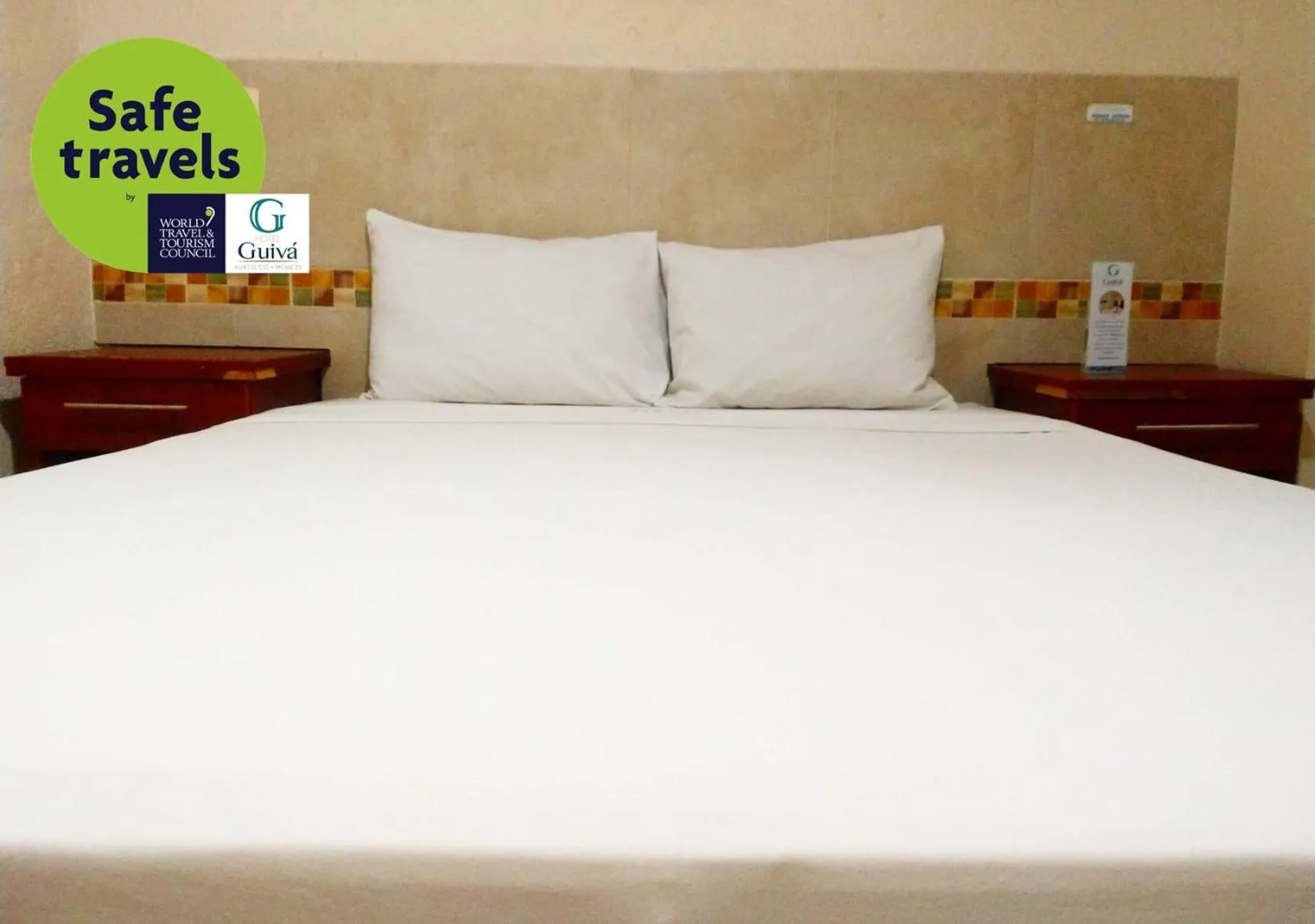 Bed in Hotel Guivá Huatulco