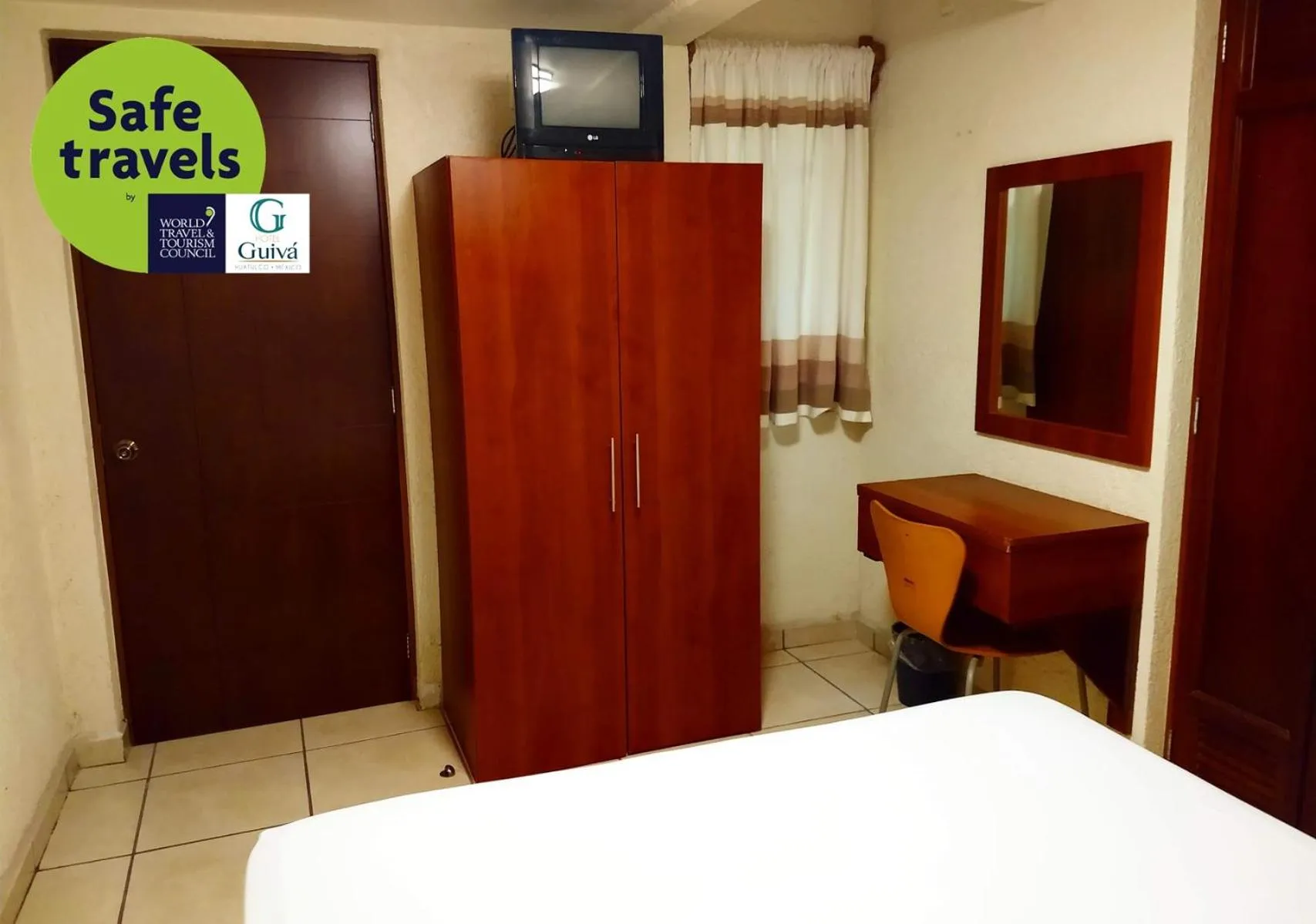 Bed in Hotel Guivá Huatulco