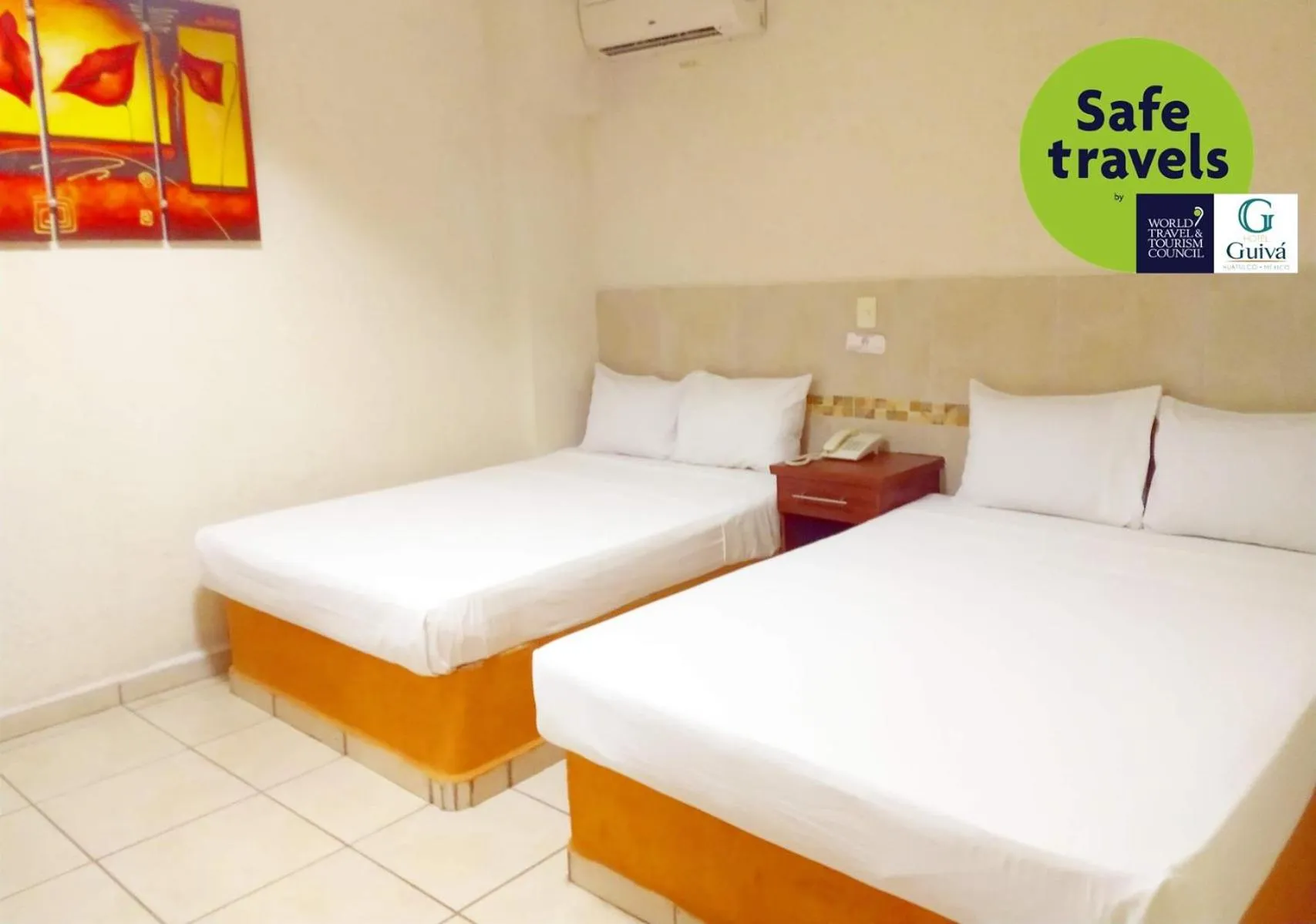 Bed in Hotel Guivá Huatulco