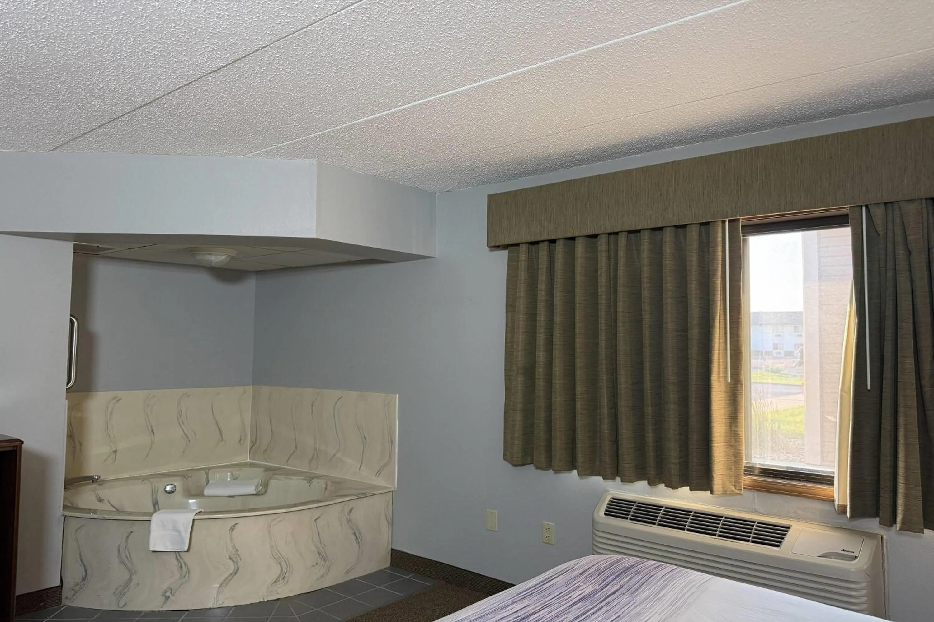 Photo of the whole room, Bed in AmericInn by Wyndham Sioux Falls