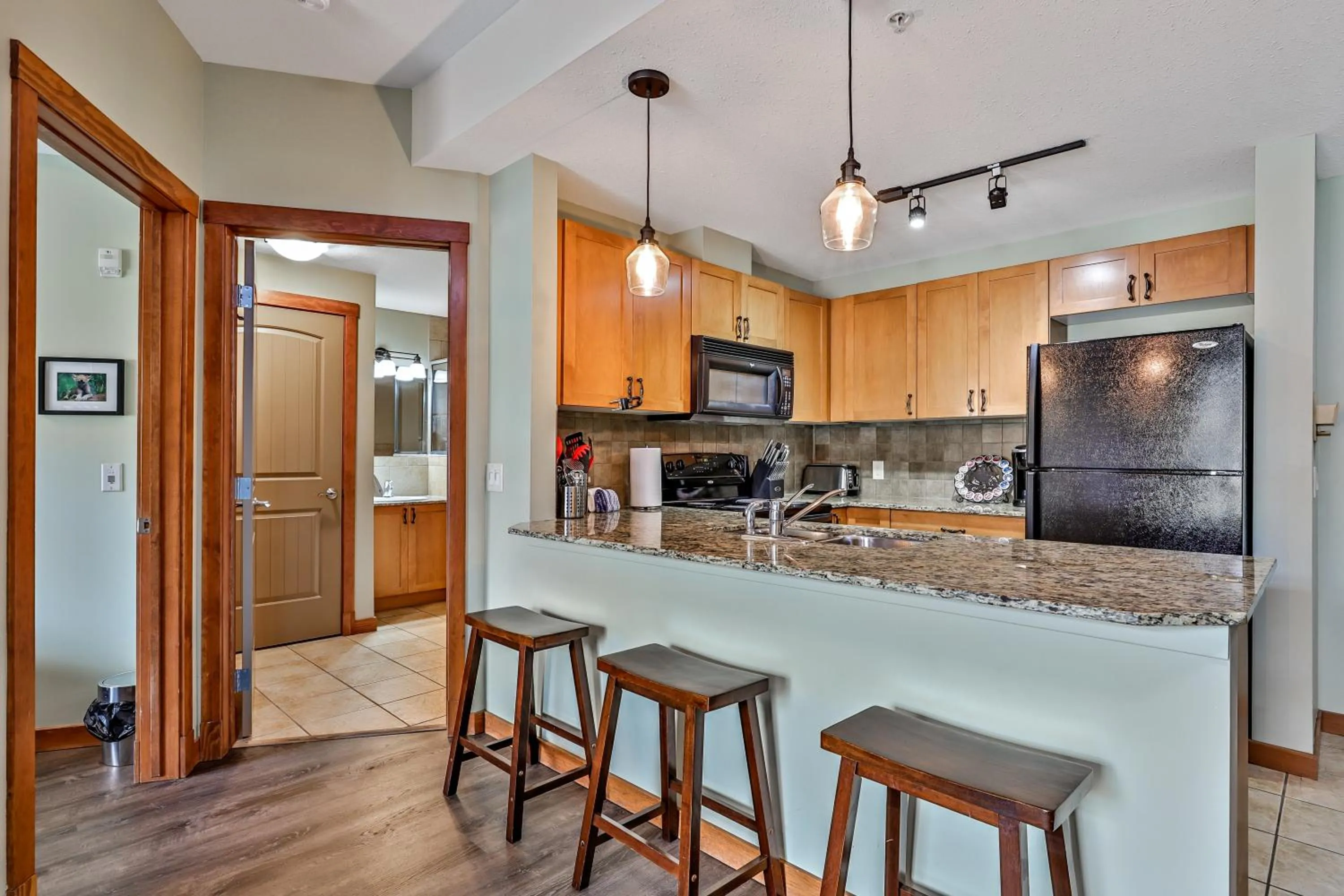 kitchen in Inviting Rocky Mountain HOT TUB in Top Rated Condo managed by Little Sister Getaways