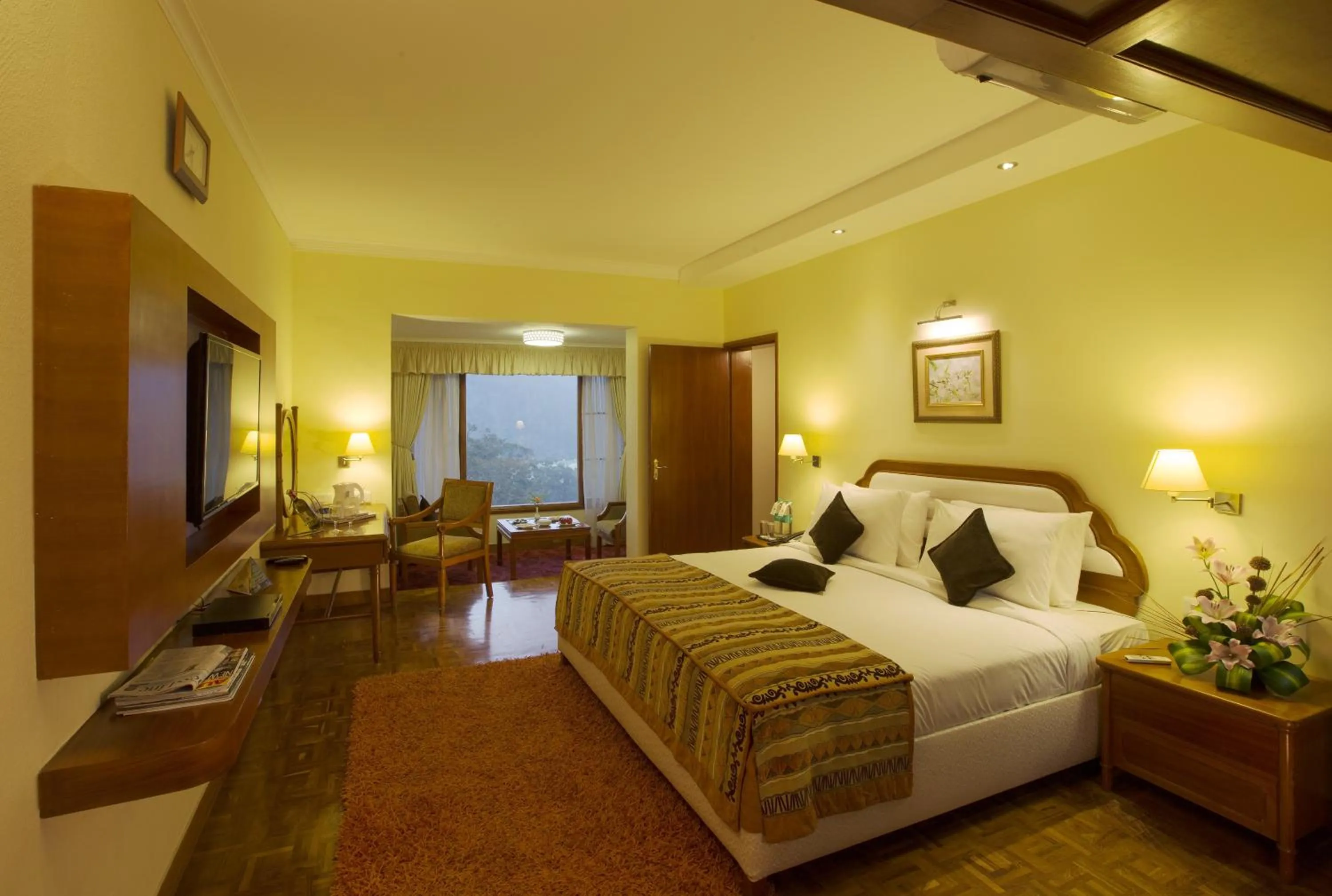 Photo of the whole room, Bed in Gem Park Ooty