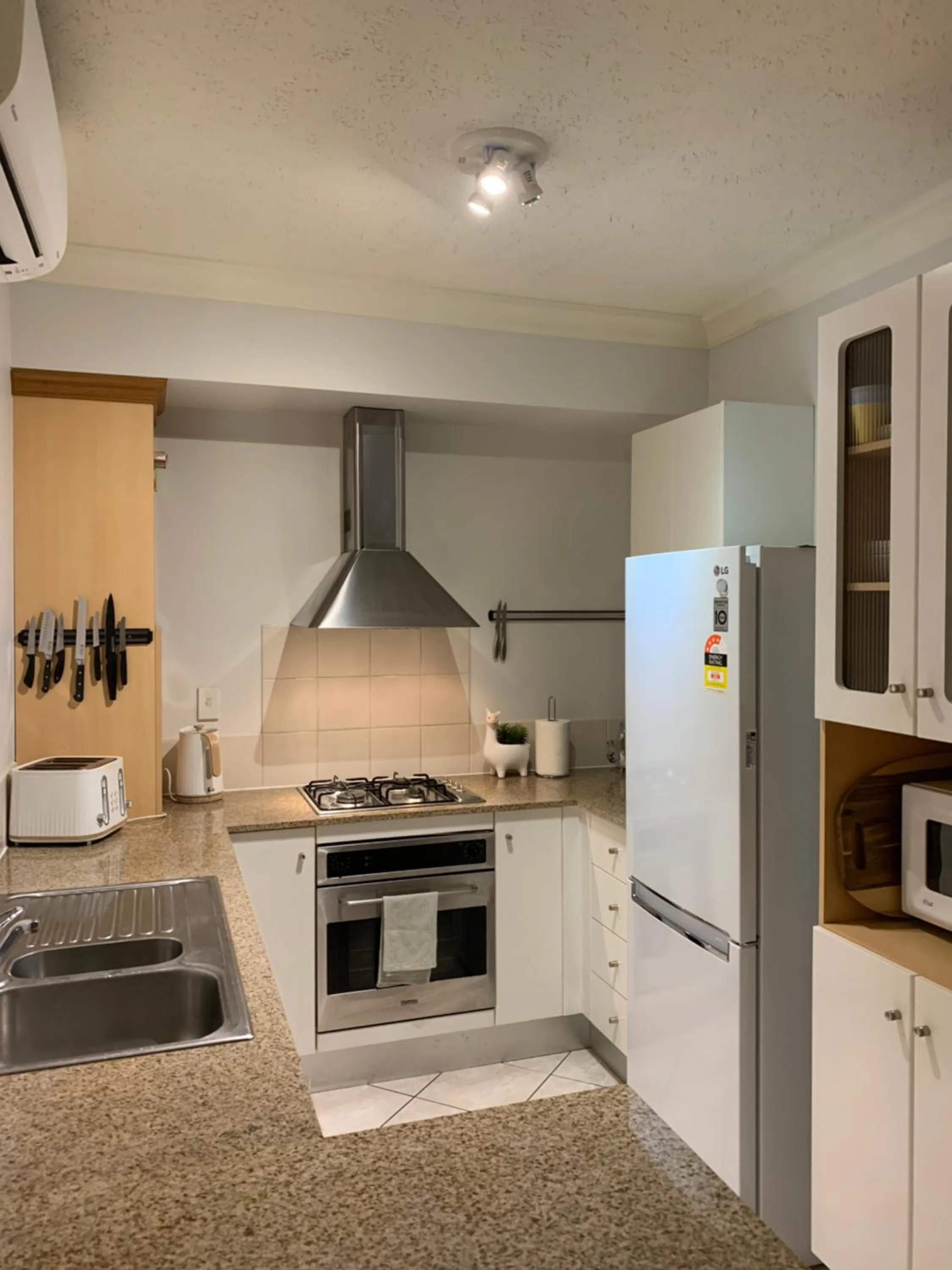 Kitchen or kitchenette in The Lakes Resort Cairns