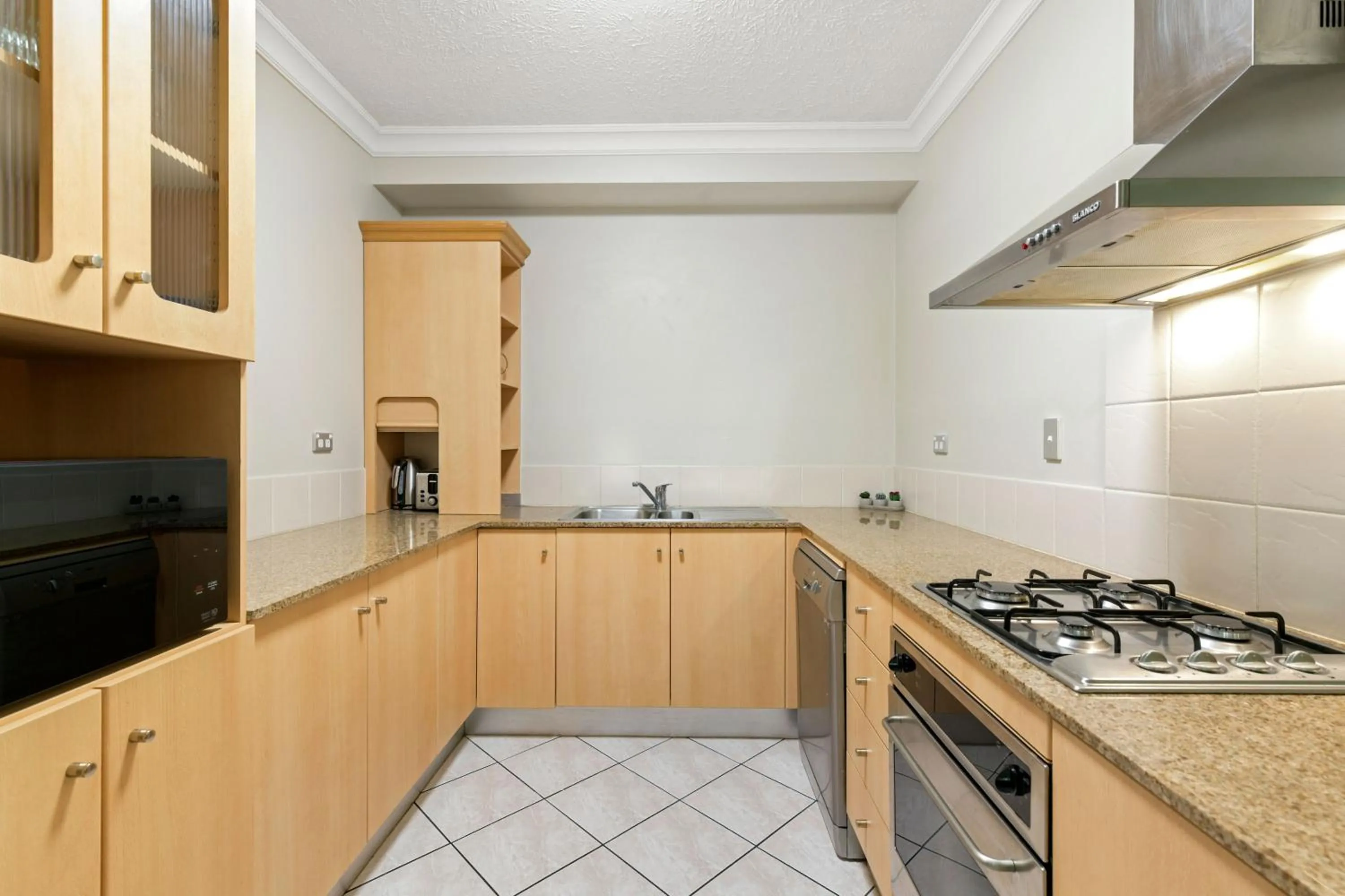 Kitchen or kitchenette in The Lakes Resort Cairns