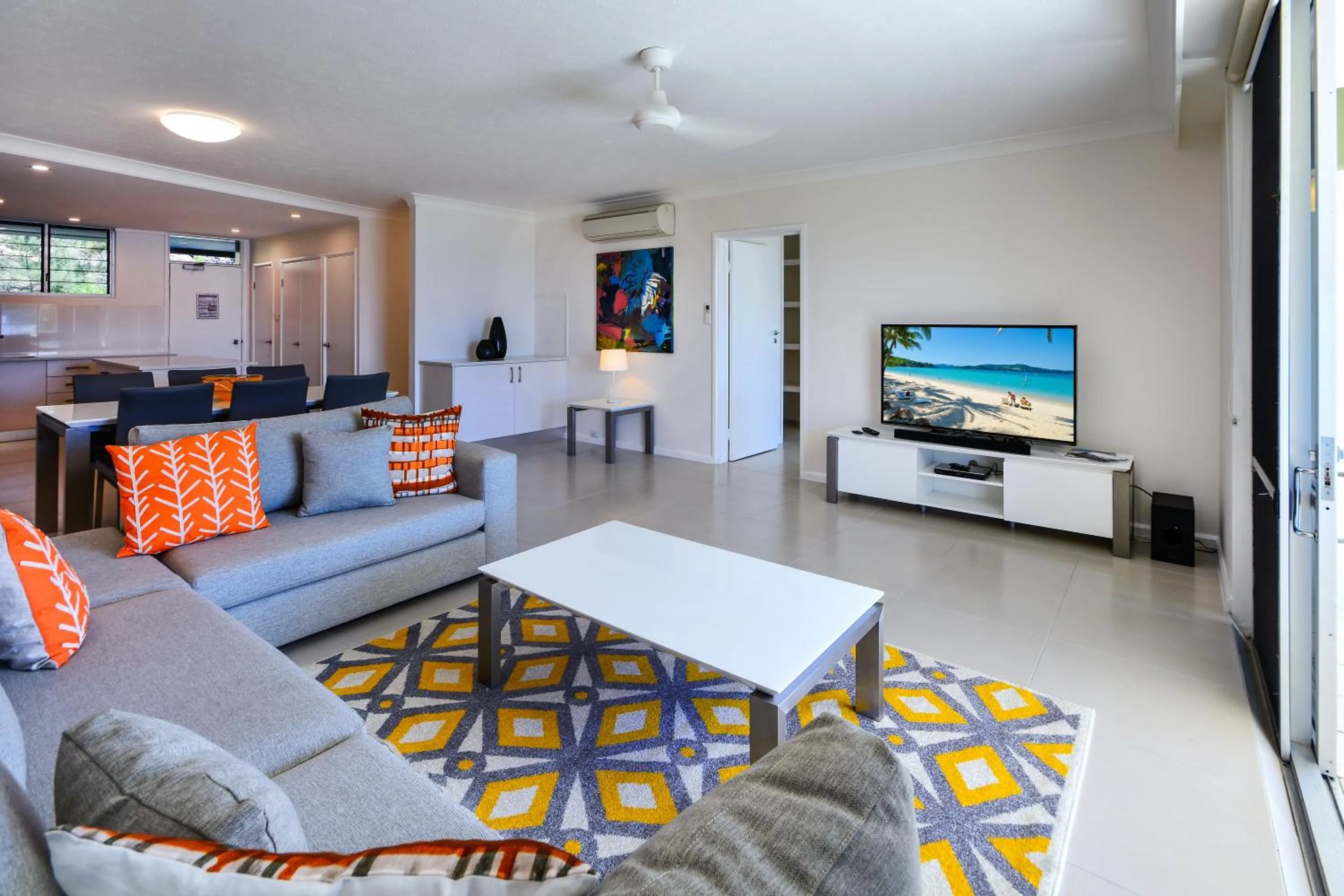 Communal lounge/ TV room in Hamilton Island Holiday Homes