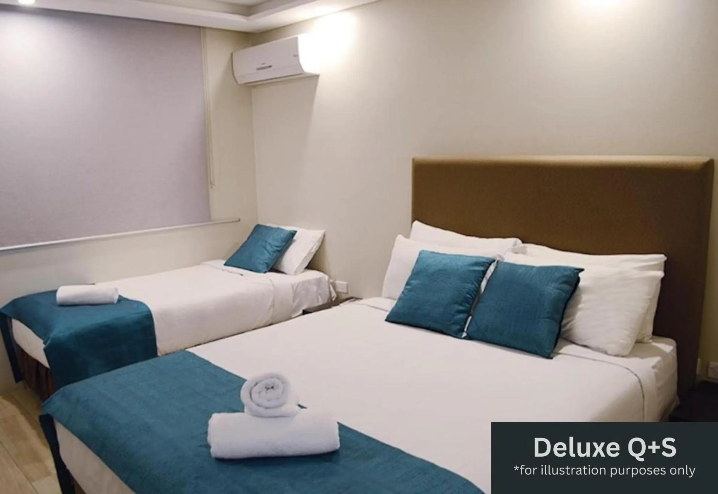 Bed in Marco Polo Motor Inn Sydney Hotel