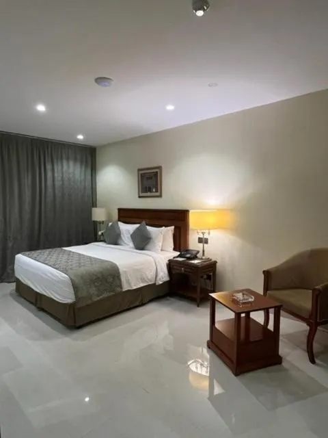 Bed in Al Gosaibi Hotel - Villa