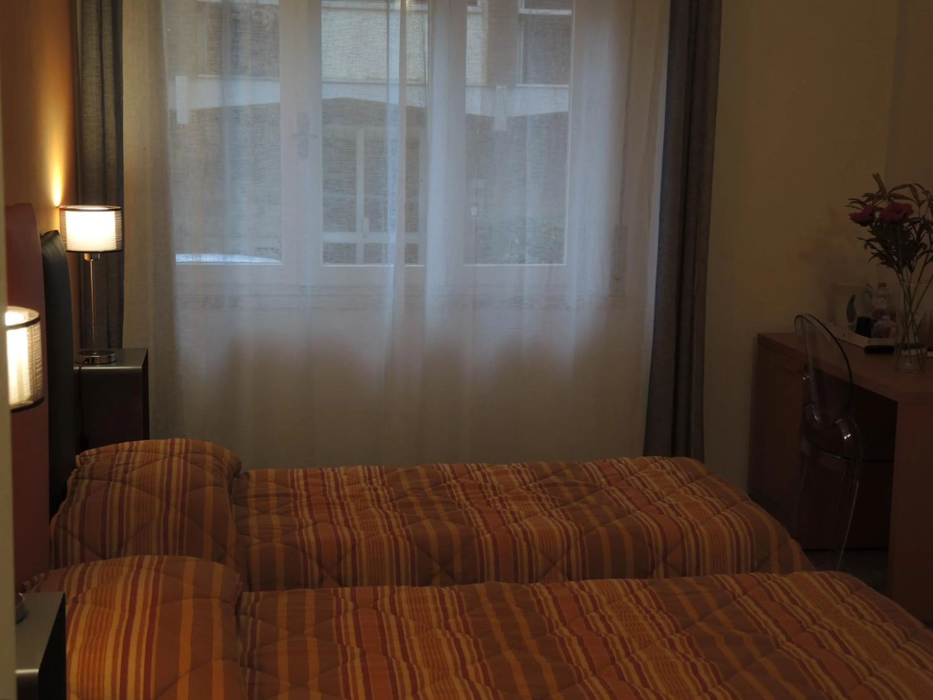 Bed in B&B Ariston Pisa Tower