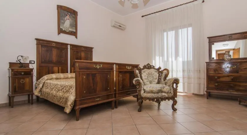 Bed in B&B Il Giardino Dei Mandarini