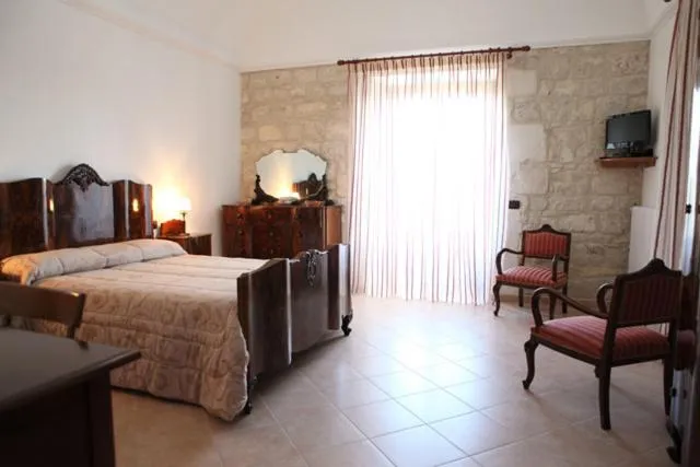 Photo of the whole room, Bed in B&B Il Giardino Dei Mandarini