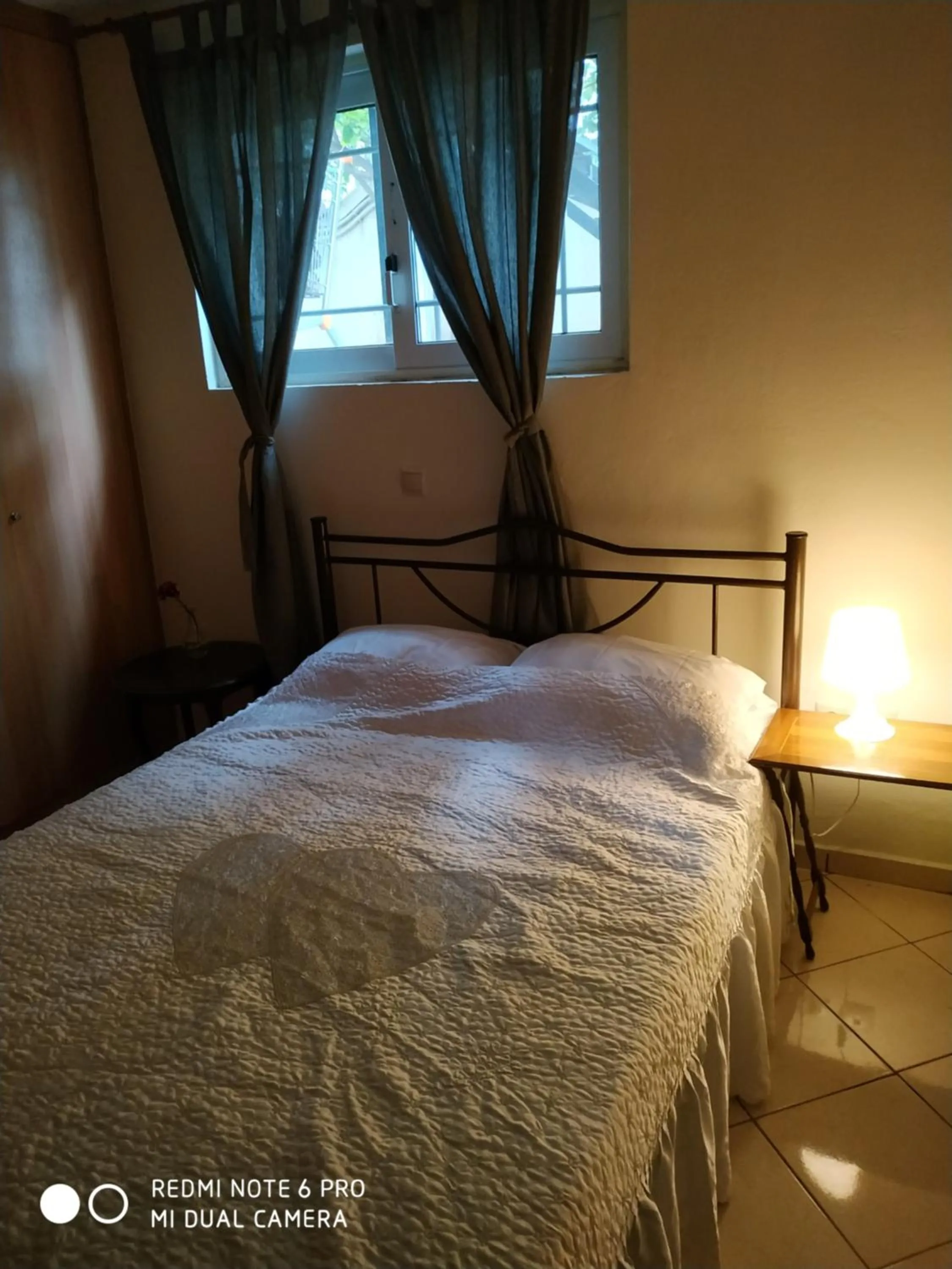 Bed in Stavros Apartments