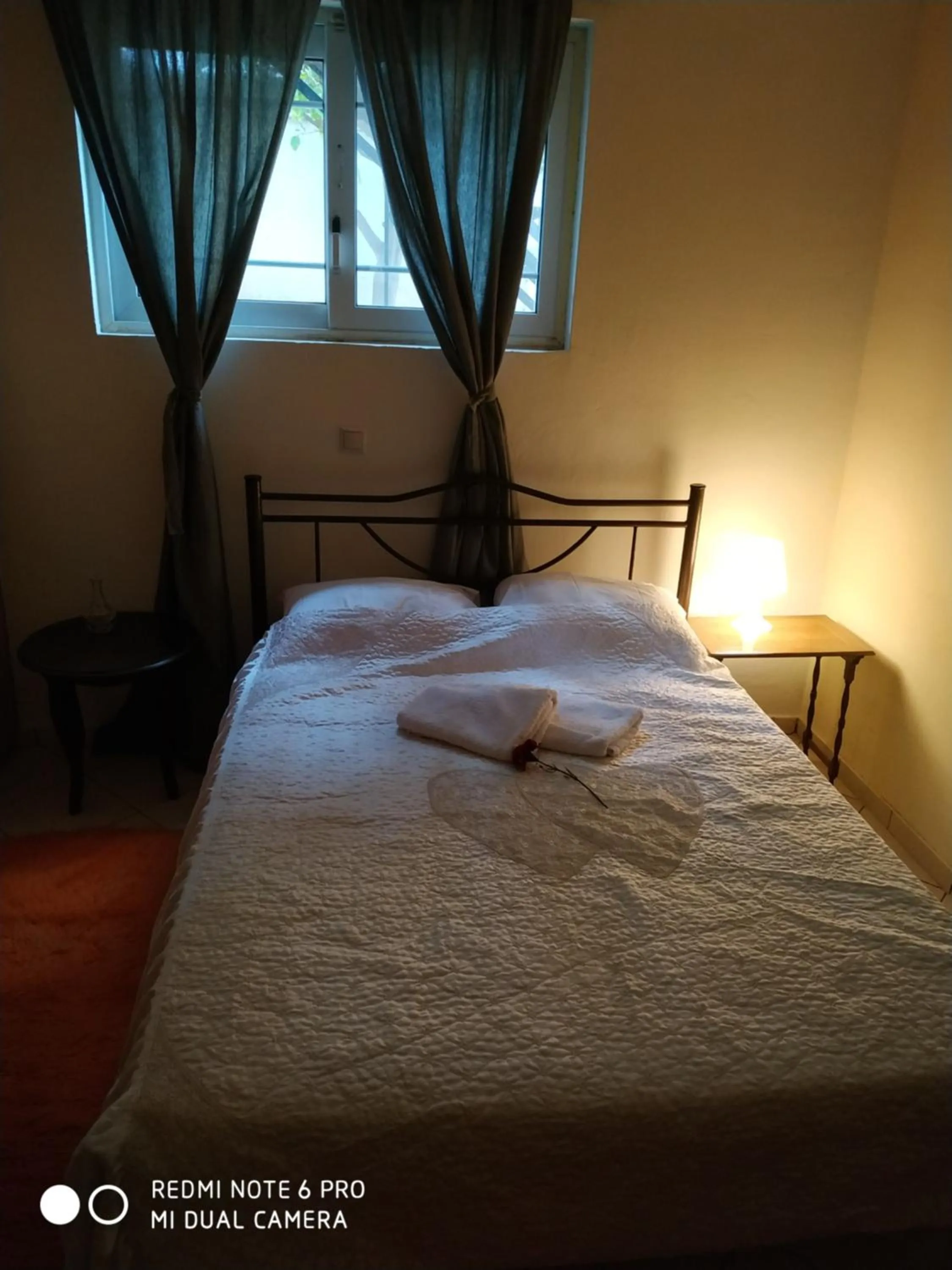 Bed in Stavros Apartments