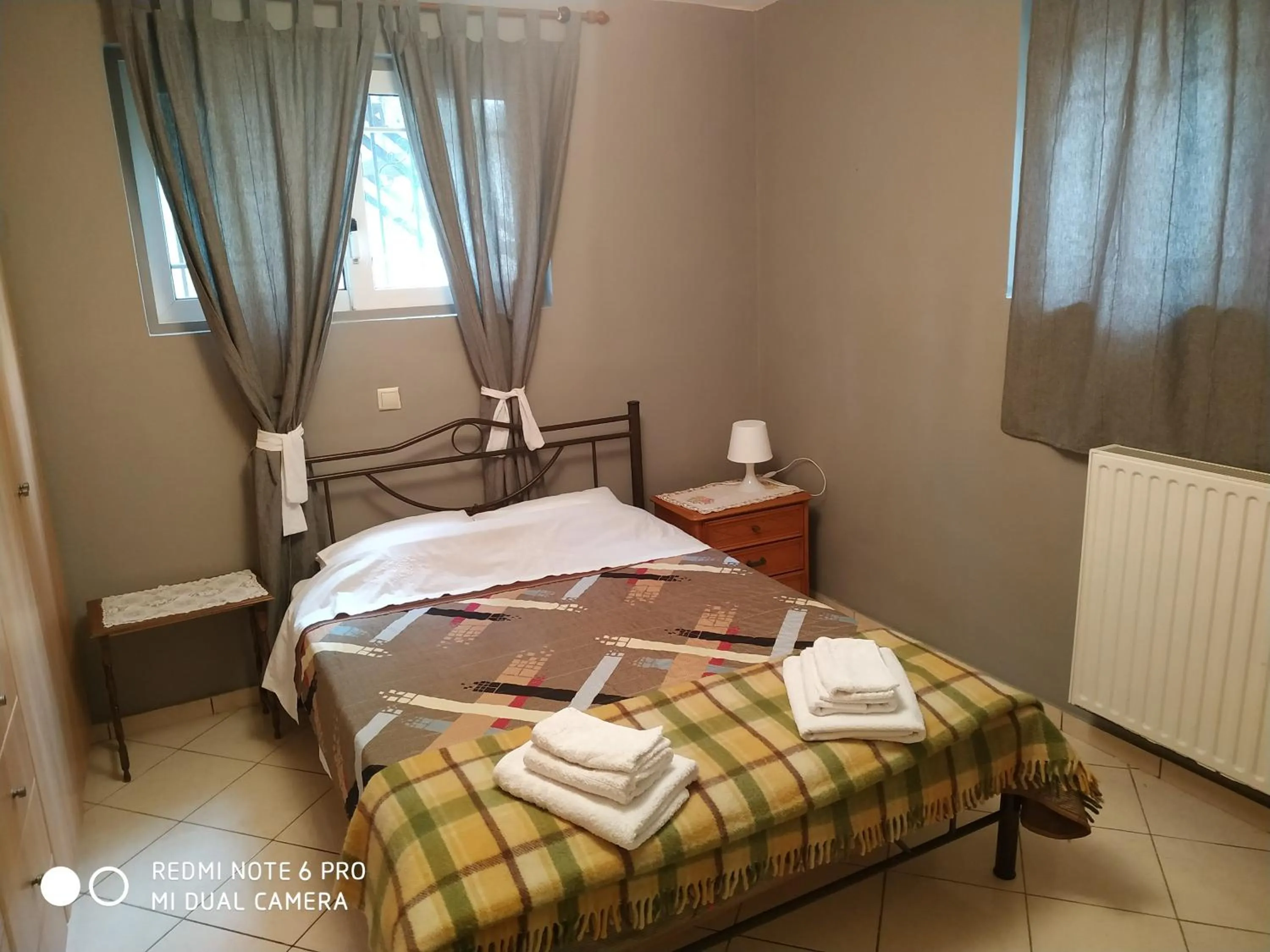 Bed in Stavros Apartments