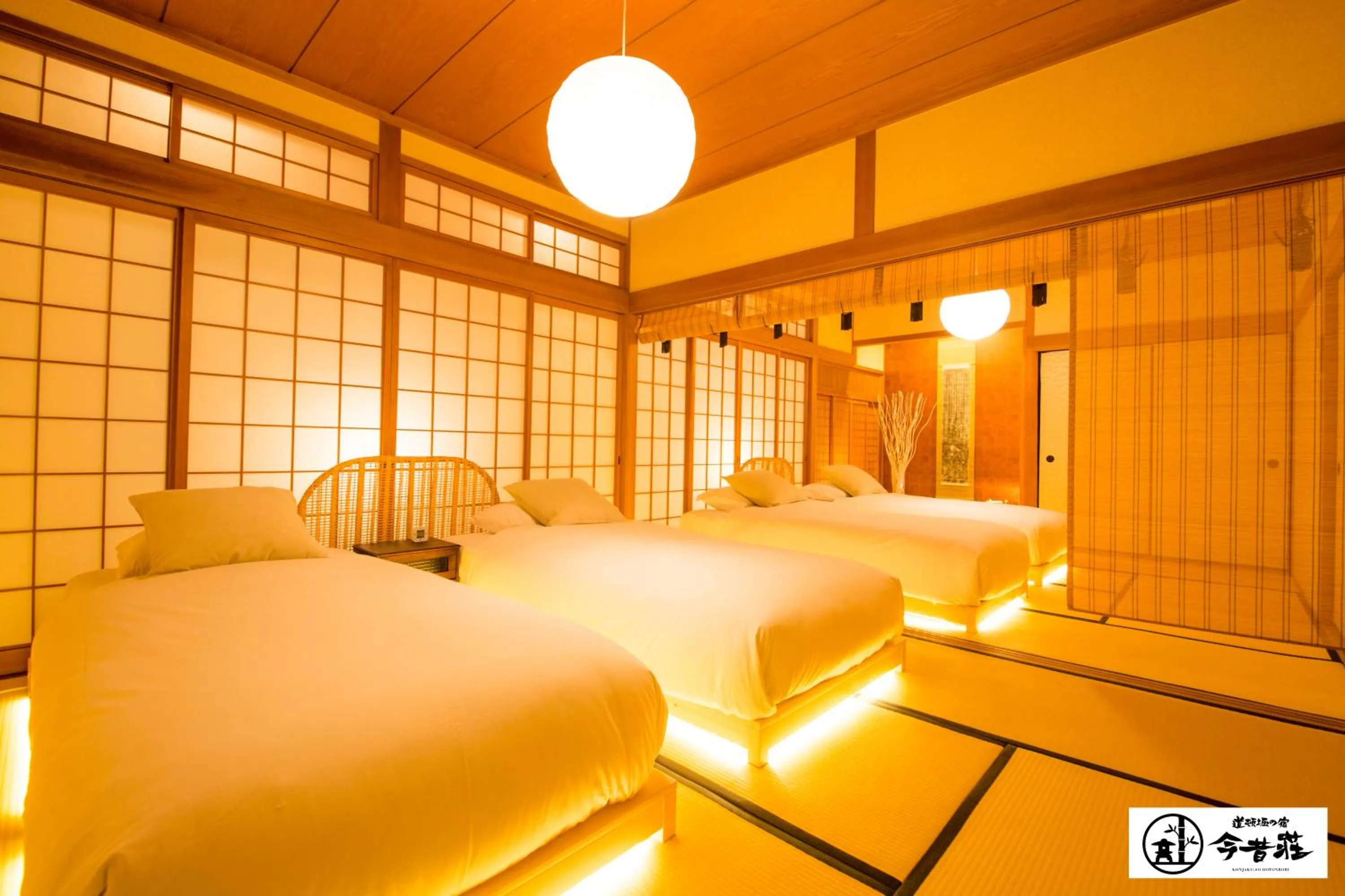 Photo of the whole room, Bed in KONJAKUSO Osaka Dotonbori "YORIAI" Penthouse Stay