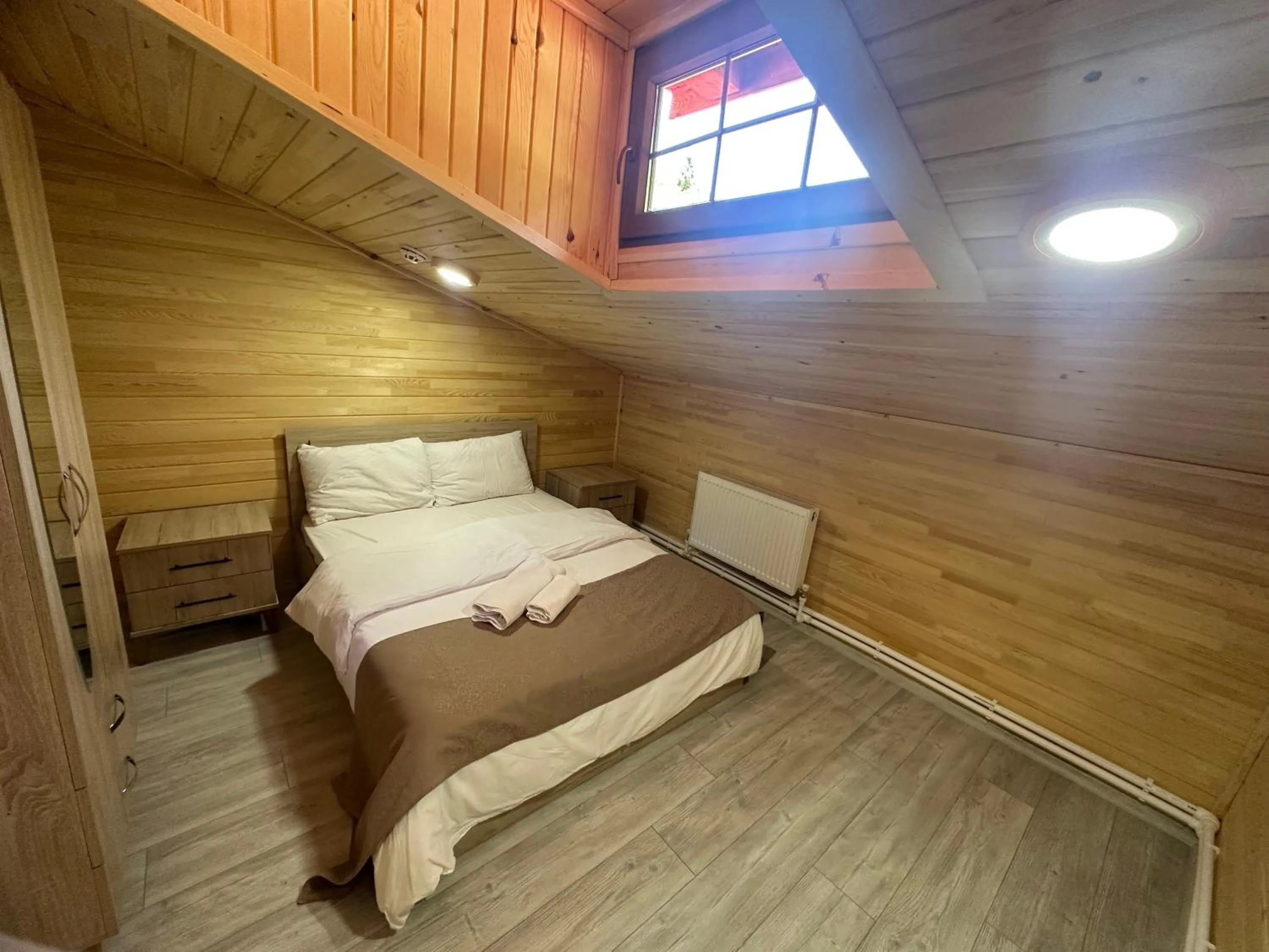 Bed in Haros Suite Hotel