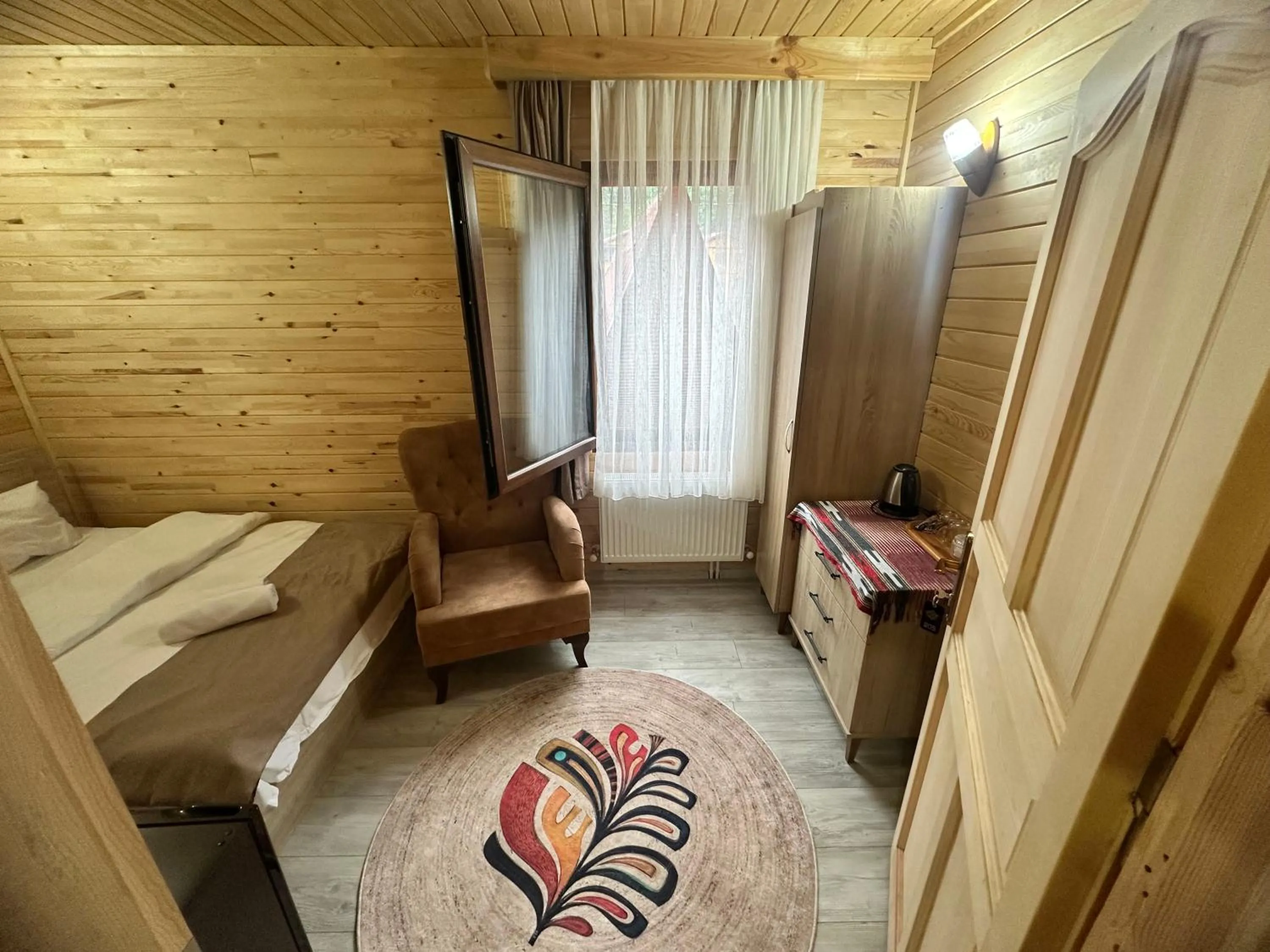 Bed in Haros Suite Hotel