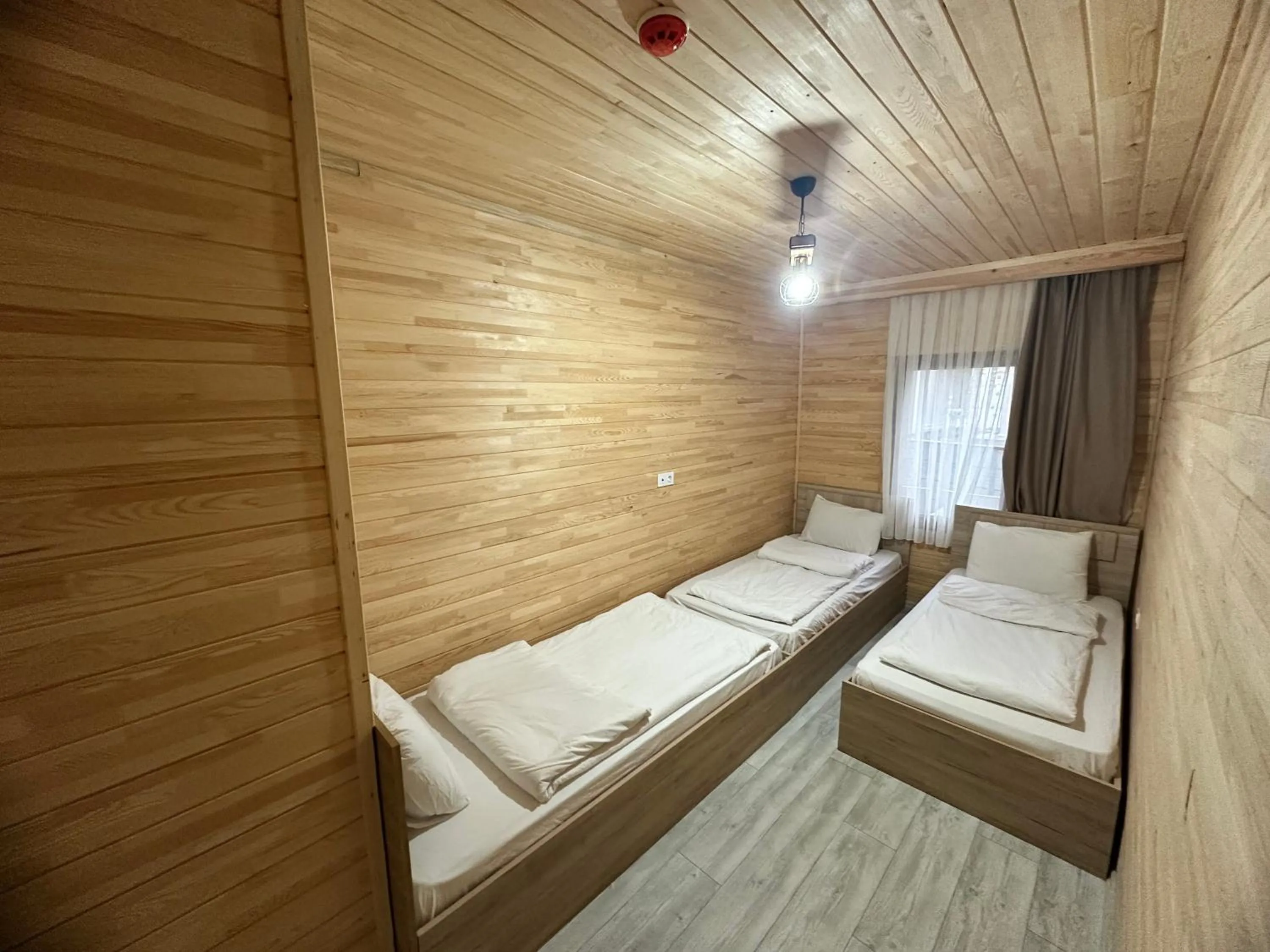 Bed in Haros Suite Hotel