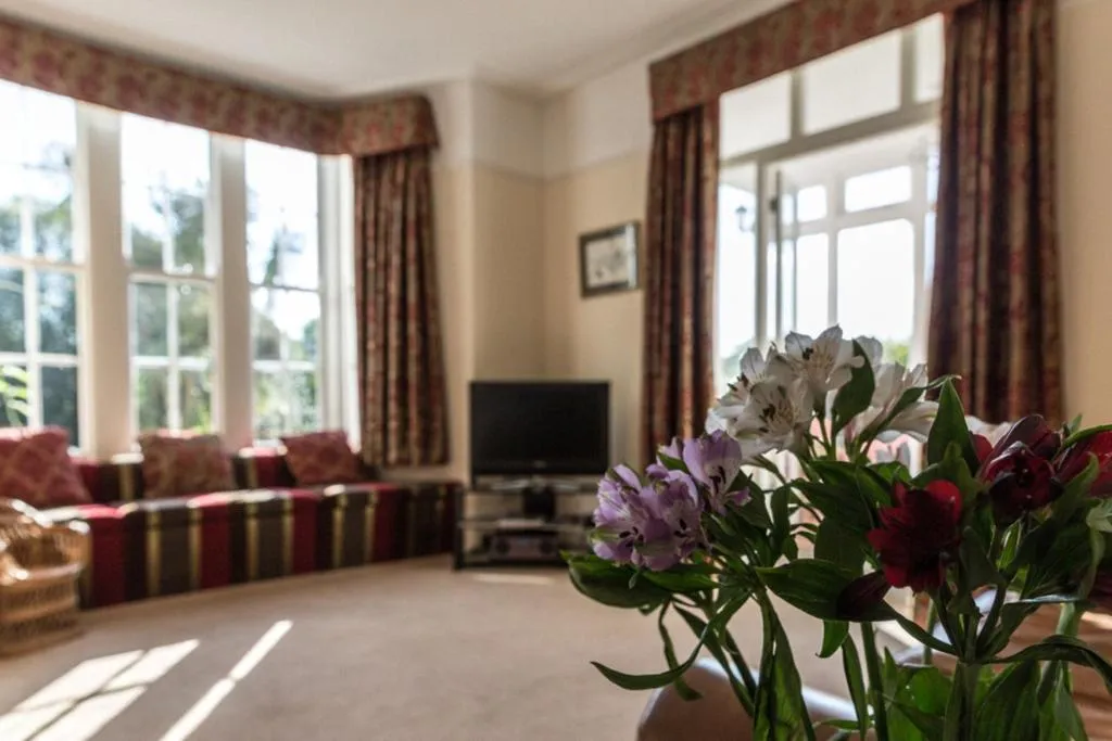 Communal lounge/ TV room in The Charterhouse