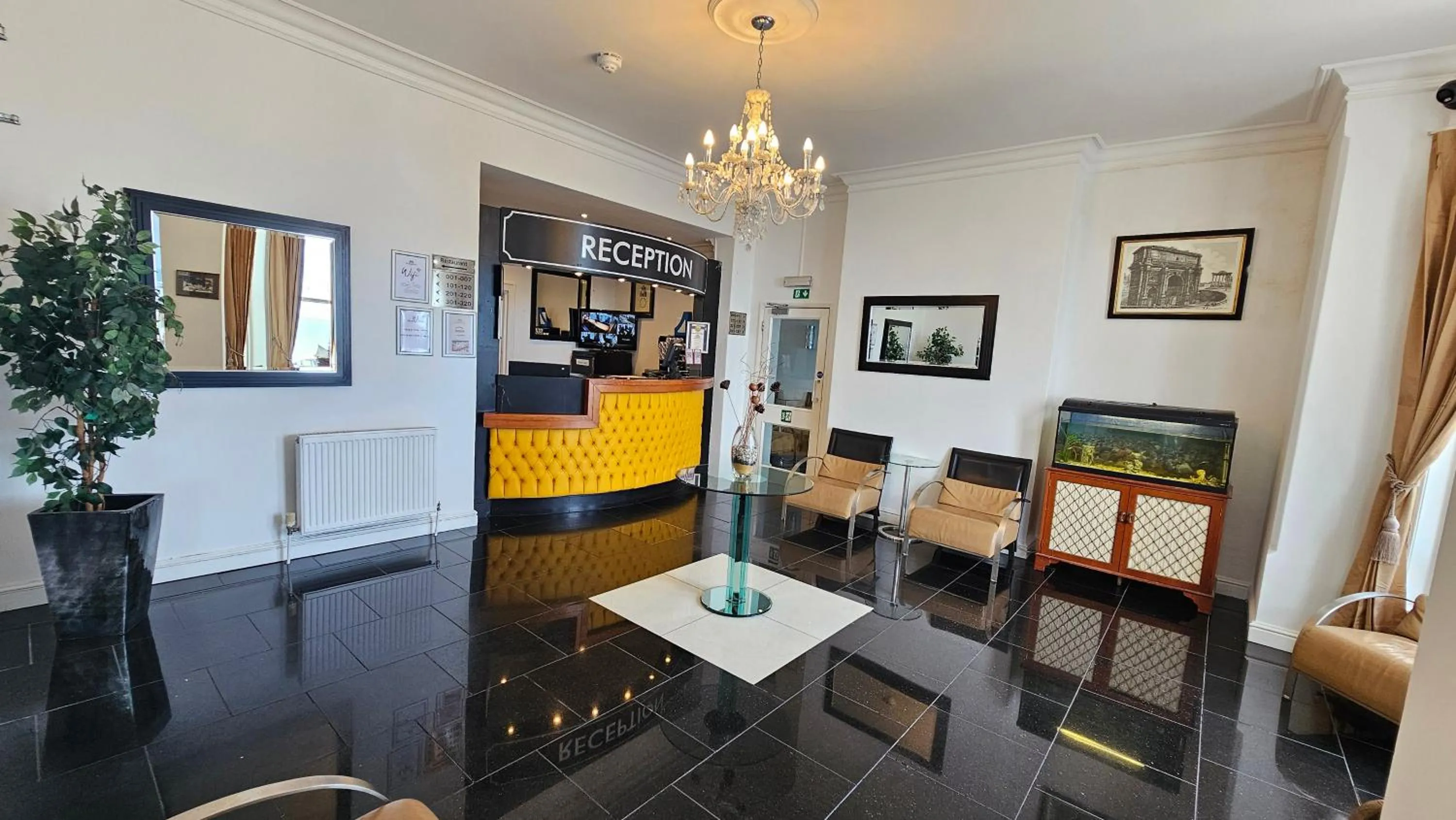 Lobby or reception in The Strand Hotel