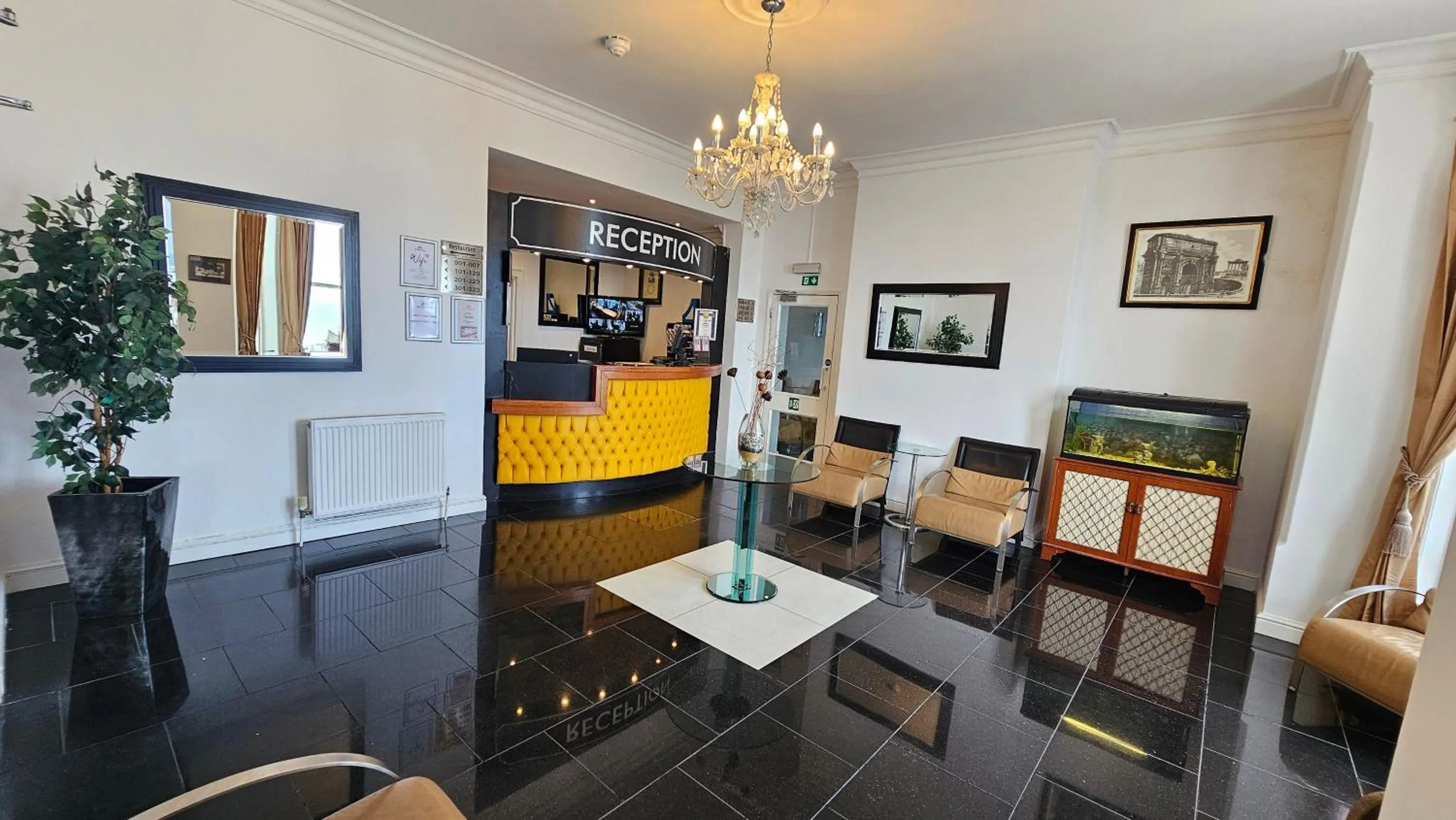 Lobby or reception in The Strand Hotel