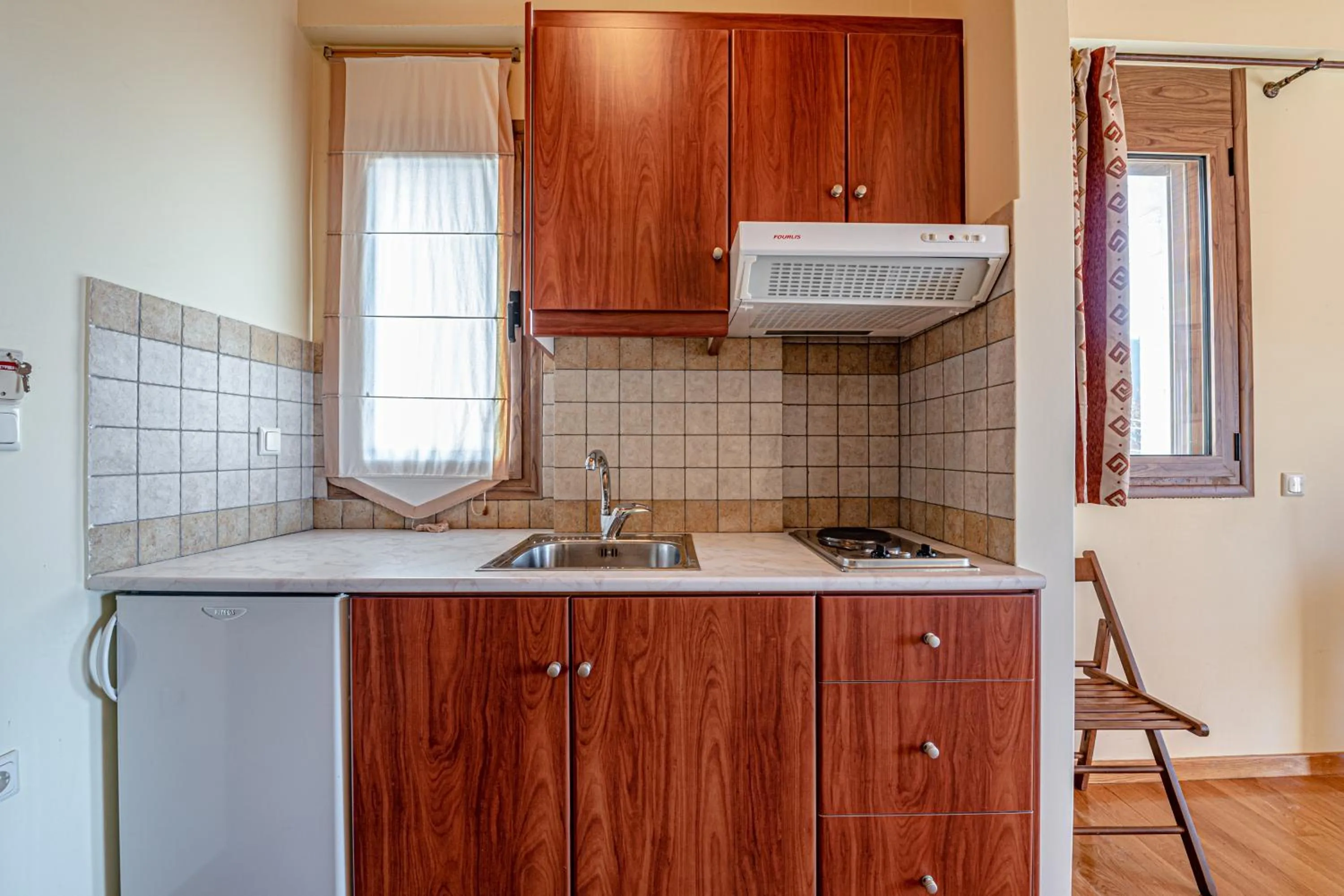 Kitchen or kitchenette in Xenonas Kypseli