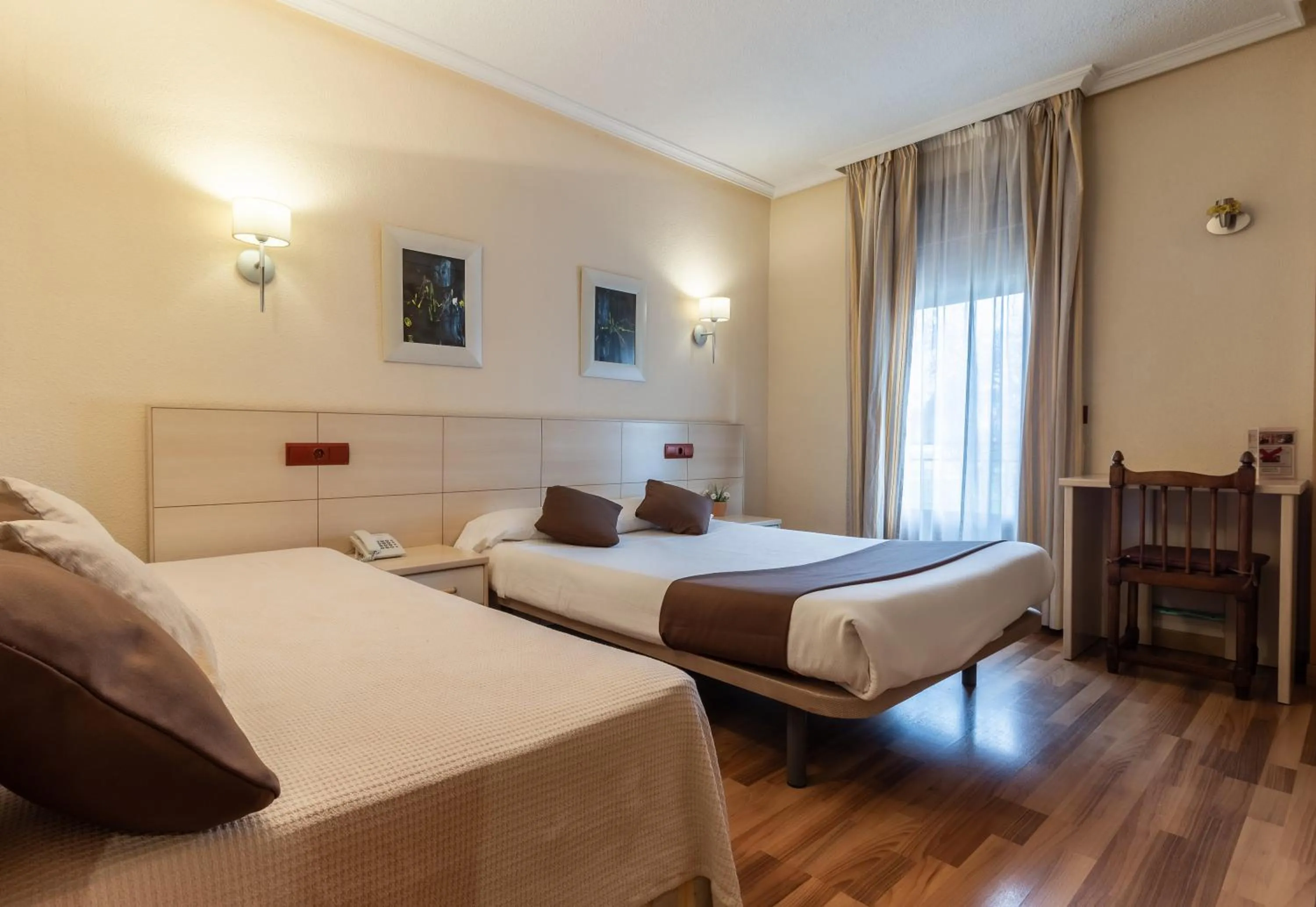 Photo of the whole room, Bed in Hostal Rural El Caño by Vivere Stays