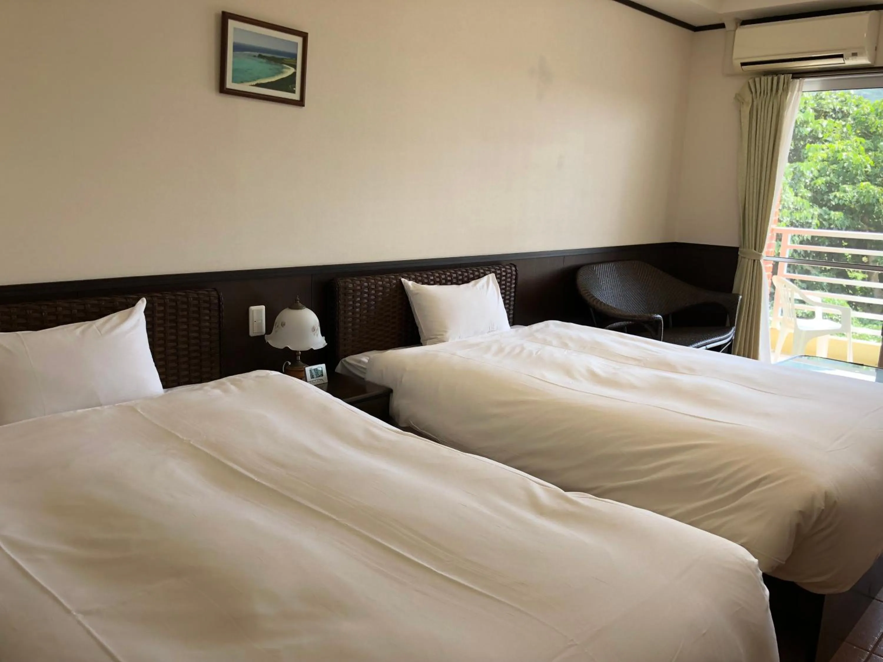 Photo of the whole room, Bed in Pine Shima Resort Coral Fish