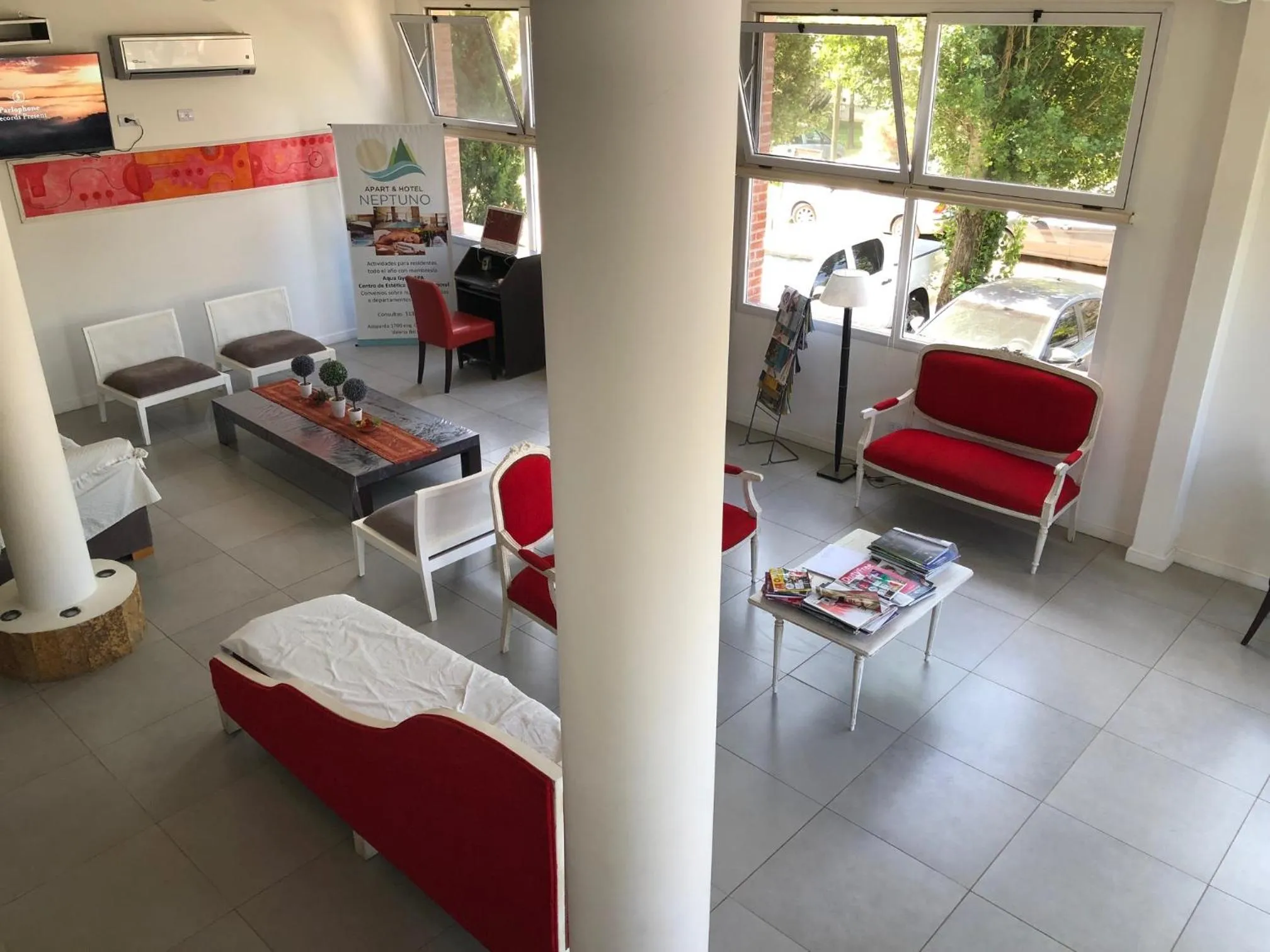 Living room, Bed in Apart & Hotel Neptuno