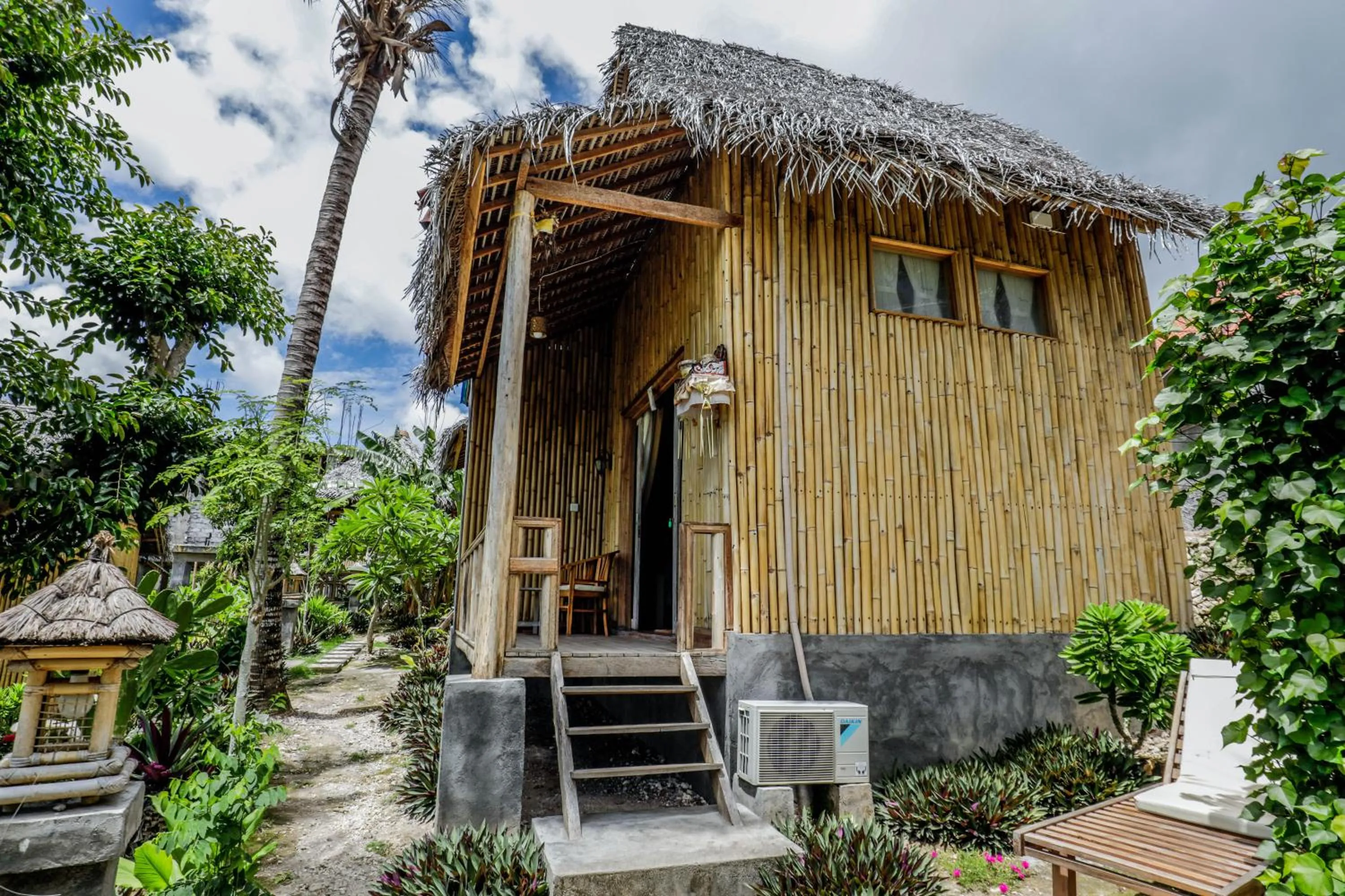 Facade/entrance in Atuh Forest Cottage