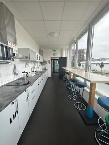 Kitchen or kitchenette in Arena Hostel & Monteurzimmer