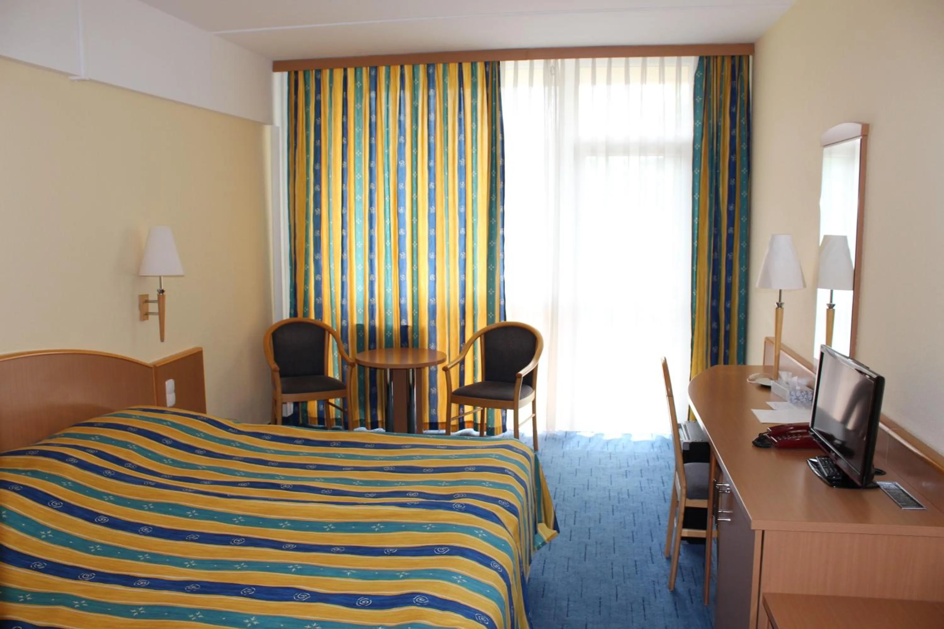 Bedroom, Bed in Mátyás Király Gyógy- és Wellness Hotel