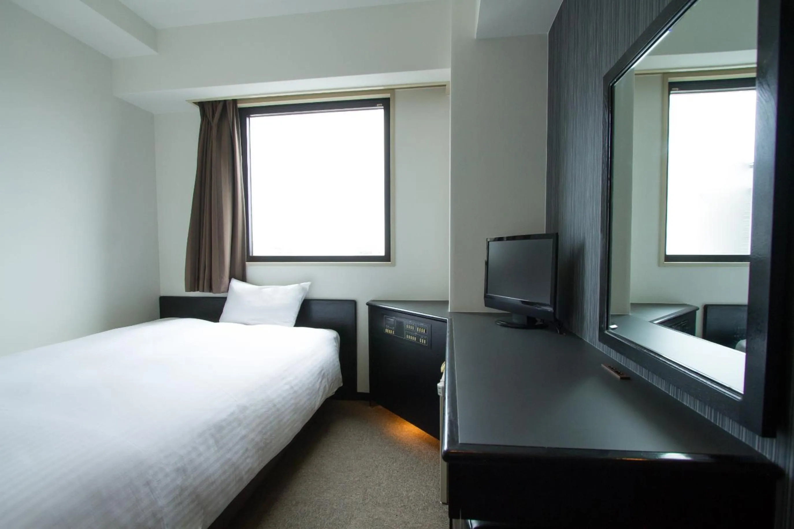 Photo of the whole room, Bed in Green Rich Hotel Oita Miyakomachi