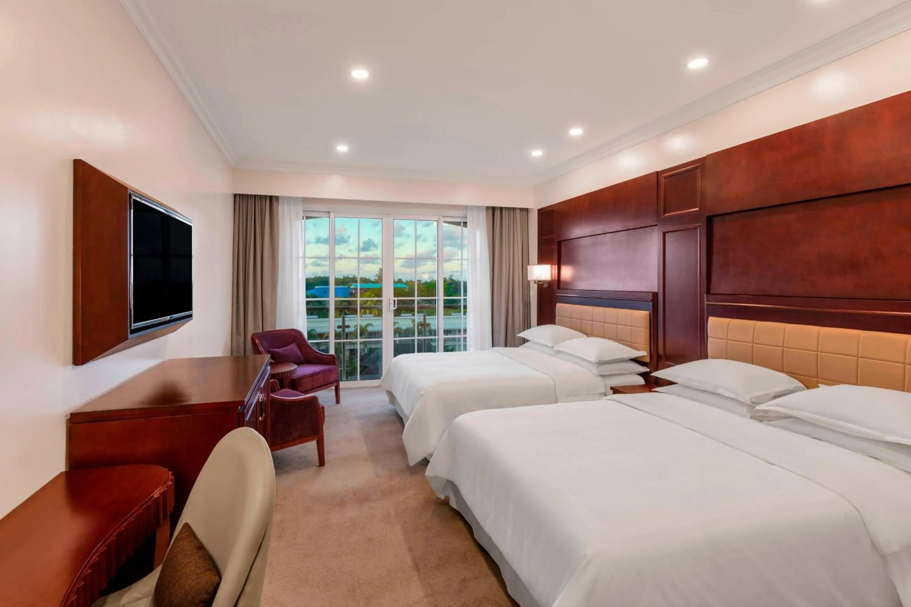 Photo of the whole room, Bed in Sheraton Samoa Aggie Grey's Hotel & Bungalows